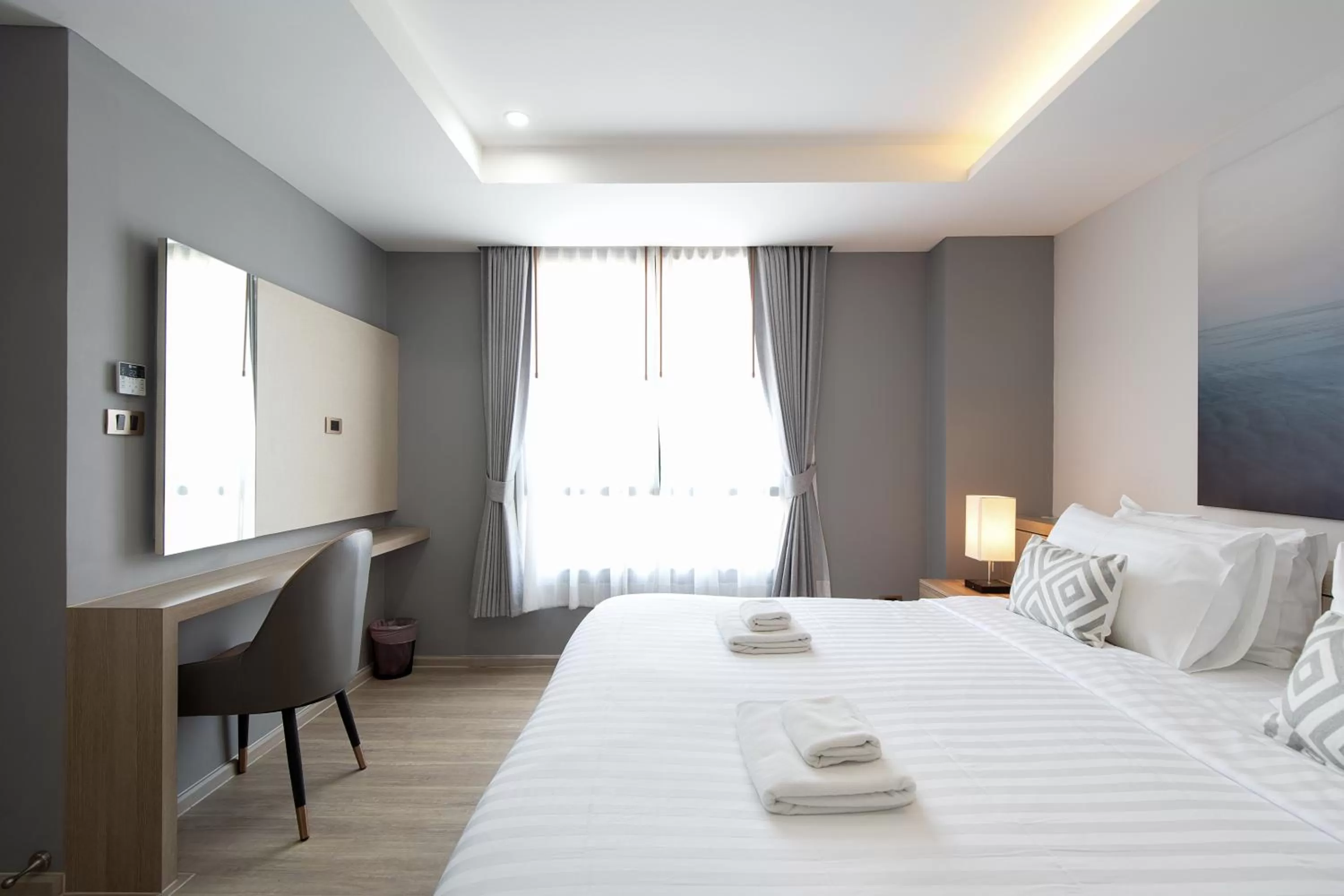 Bed in The Riski Hotel at Bangphlat Station SHA