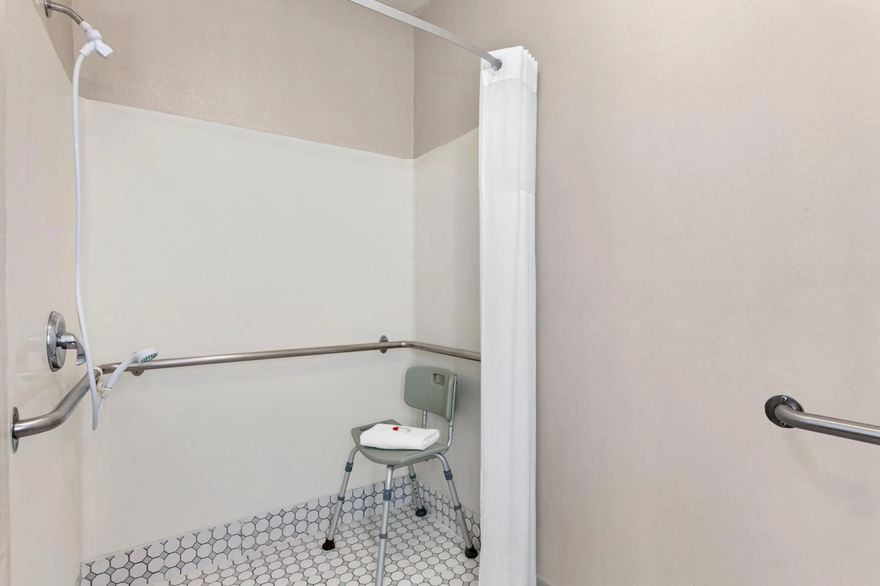 Bathroom in Days Inn by Wyndham Kansas City International Airport