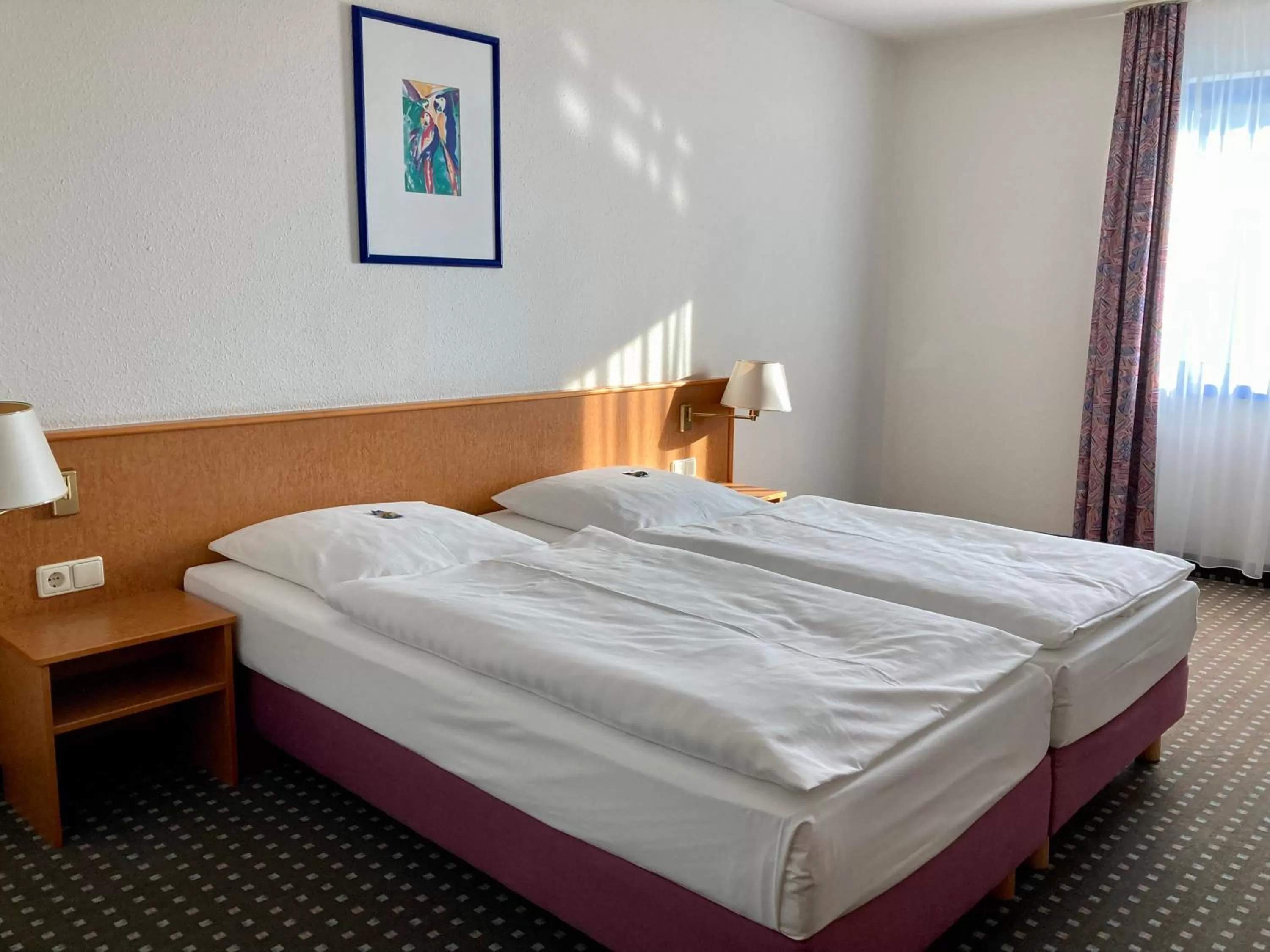 Bed in Akzent Congresshotel Hoyerswerda