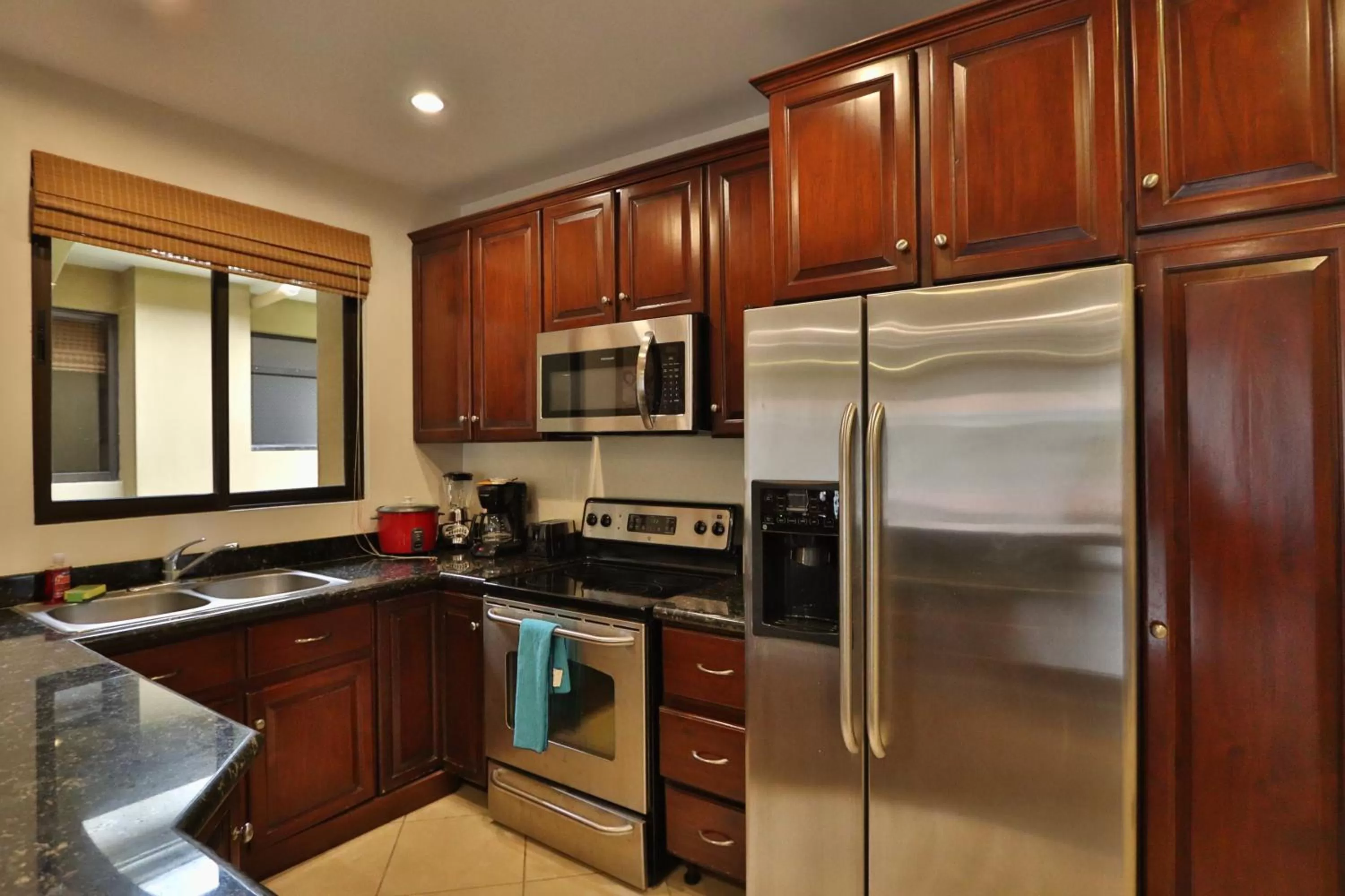 Kitchen or kitchenette in Monte Carlo Luxury Condominiums