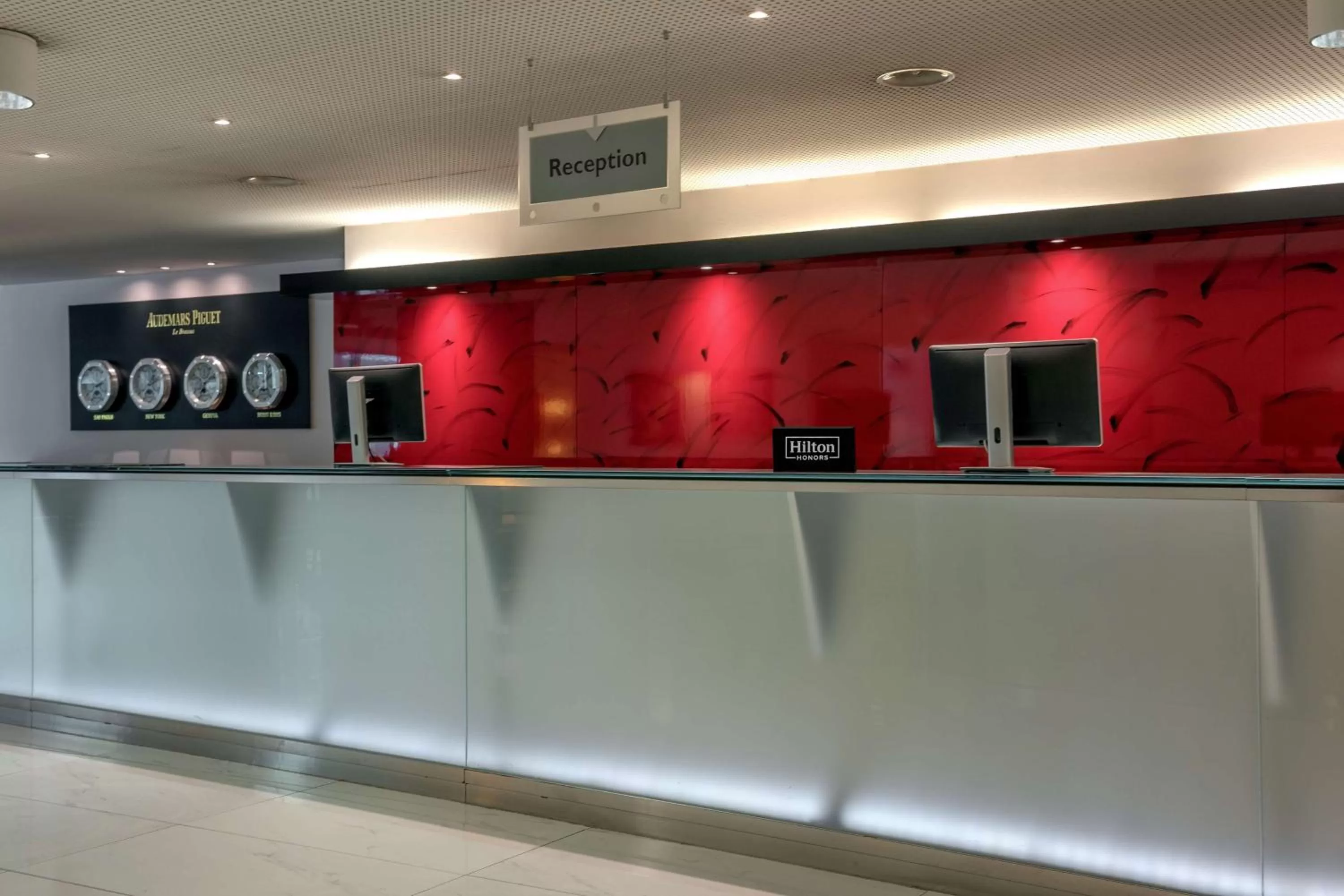 Lobby or reception in Hilton Geneva Hotel and Conference Centre