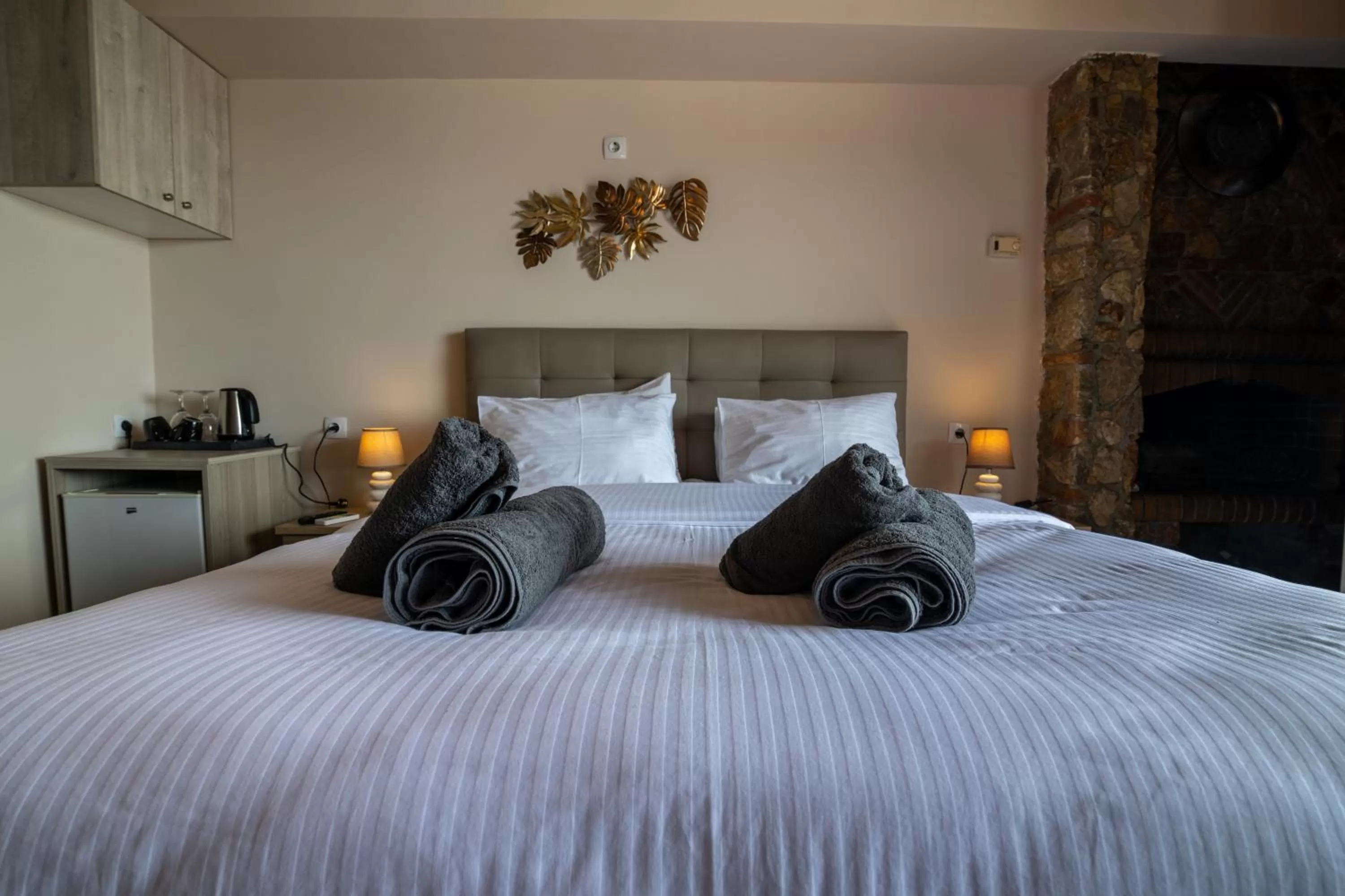 Bed in Votsalakia Hotel & Luxury Apartments