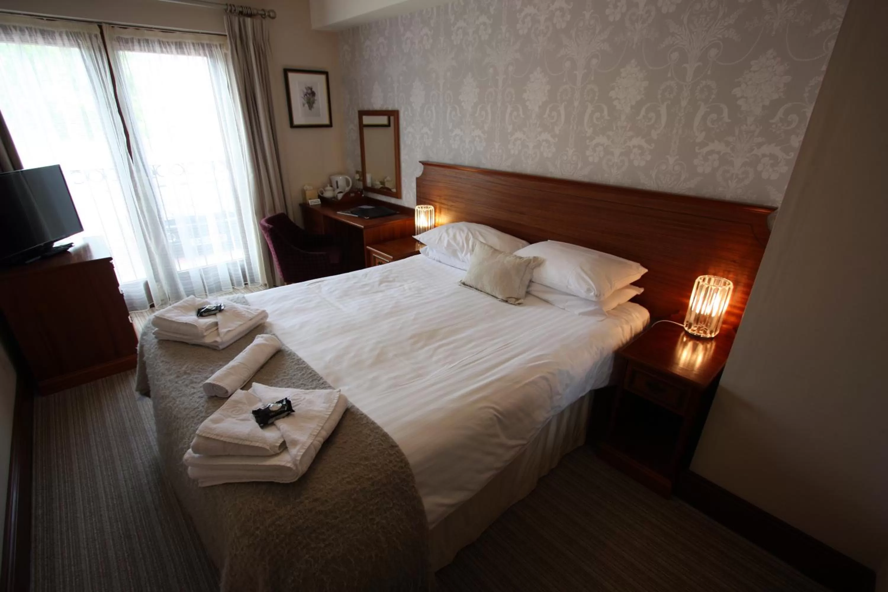 Bed in The Mary Mount Hotel