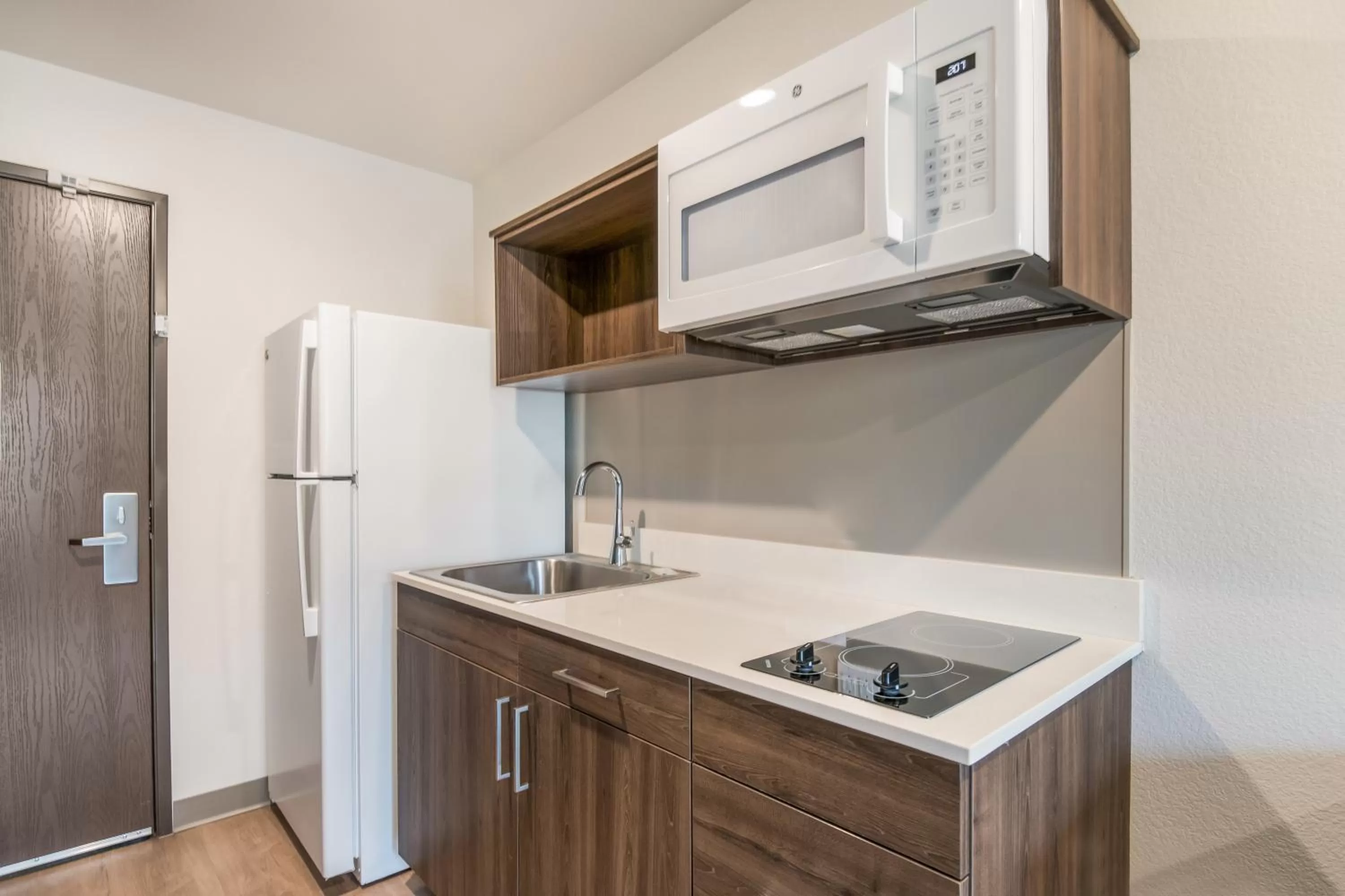 Kitchen or kitchenette in WoodSpring Suites Broomfield-Westminster