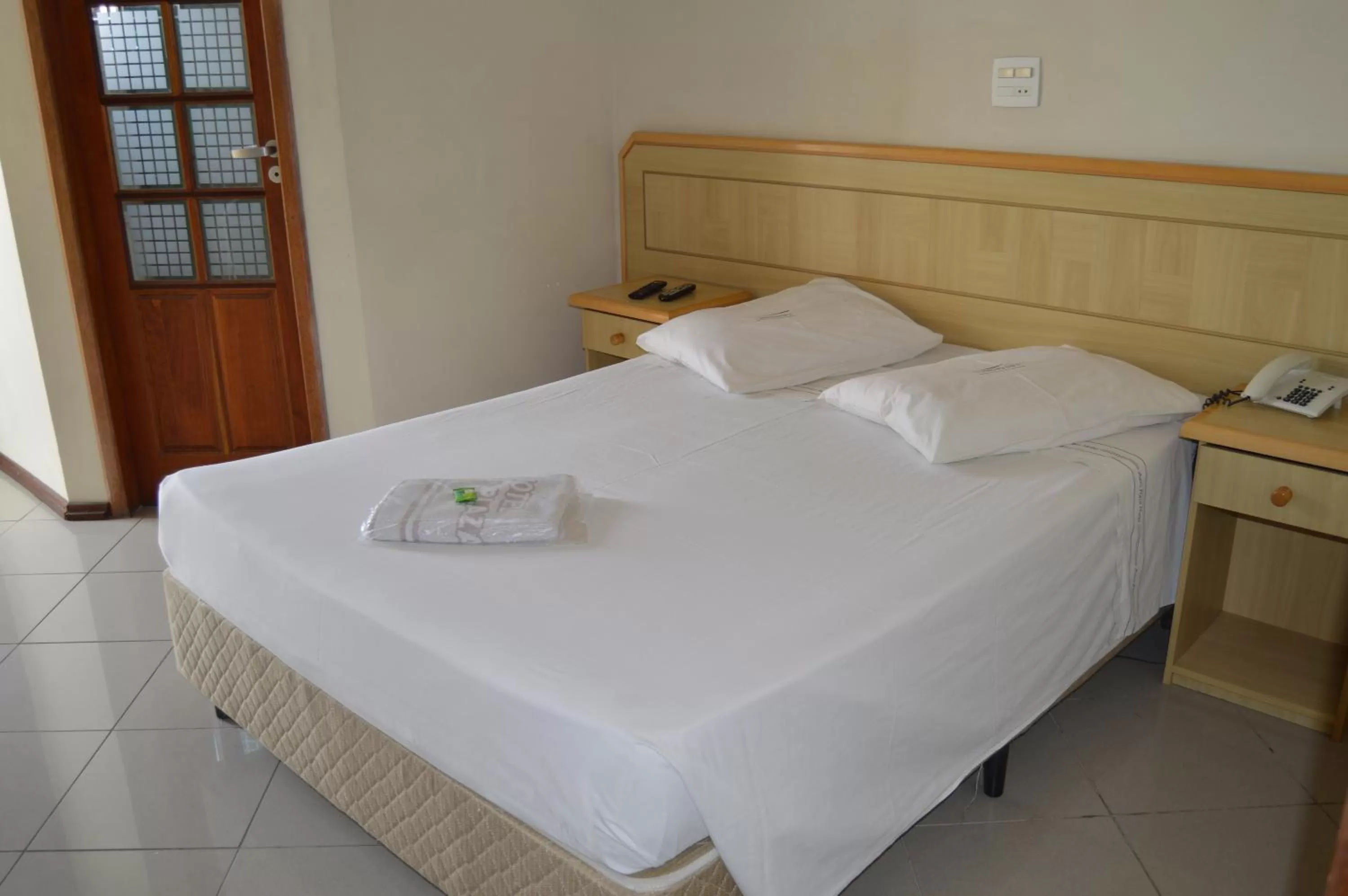 Bed in Aero Plaza Hotel