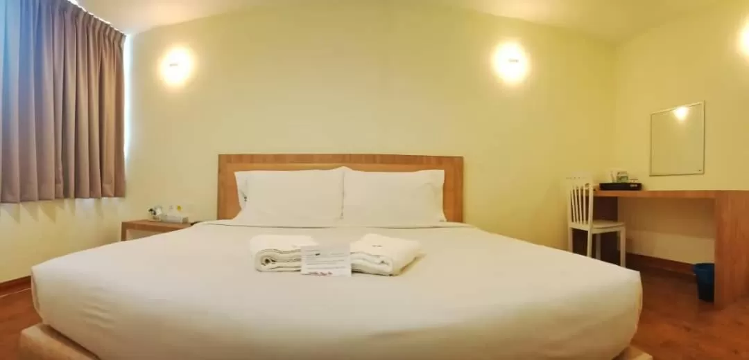 Bed in Merilton Hotel