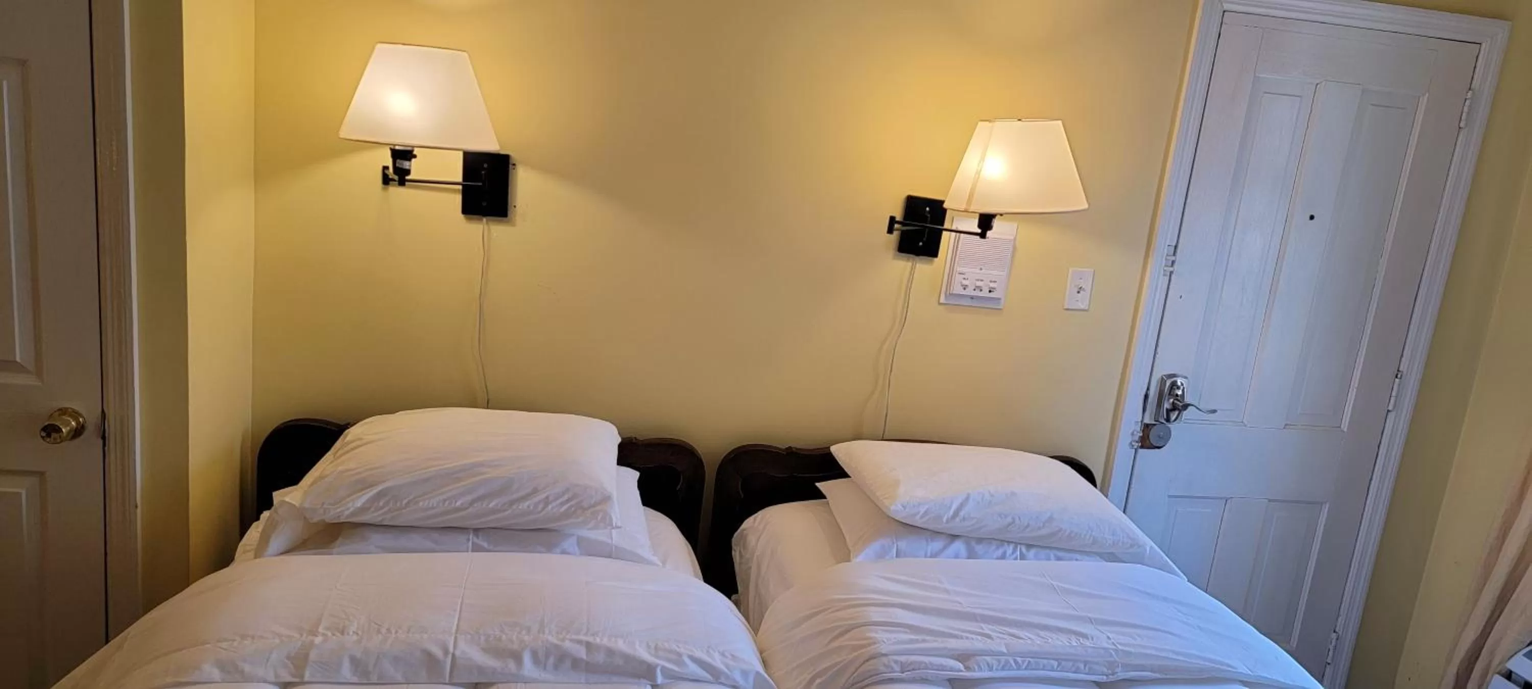 Bed in Incentra Village Hotel