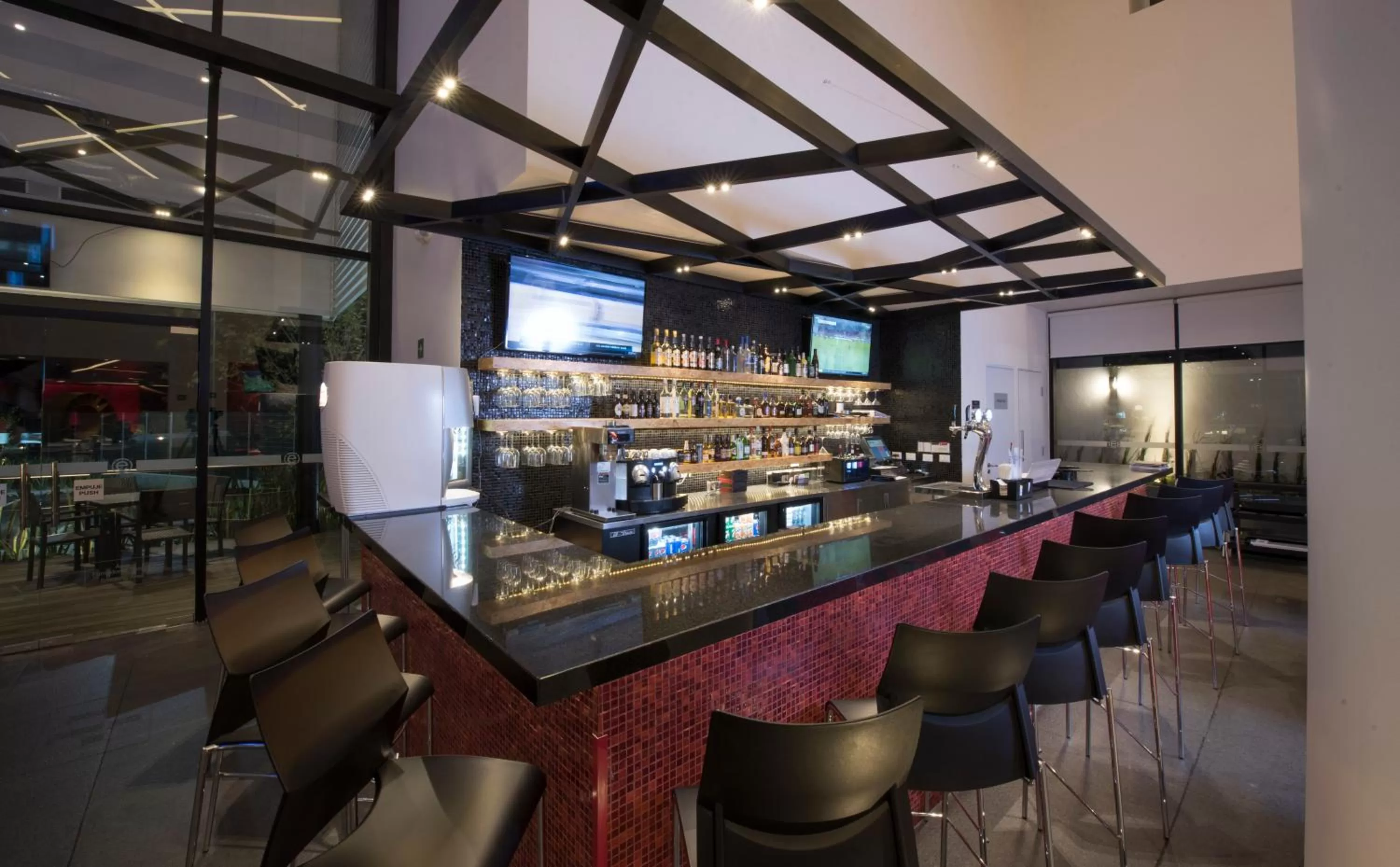 Lounge or bar in Ramada Encore by Wyndham San Luis Potosi