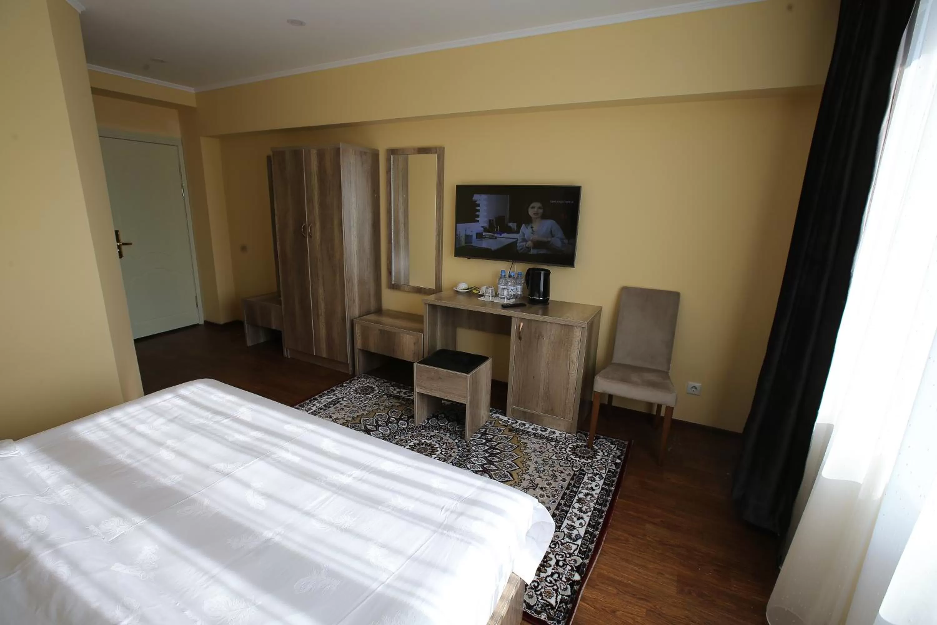 Bed in Altai Business Hotel