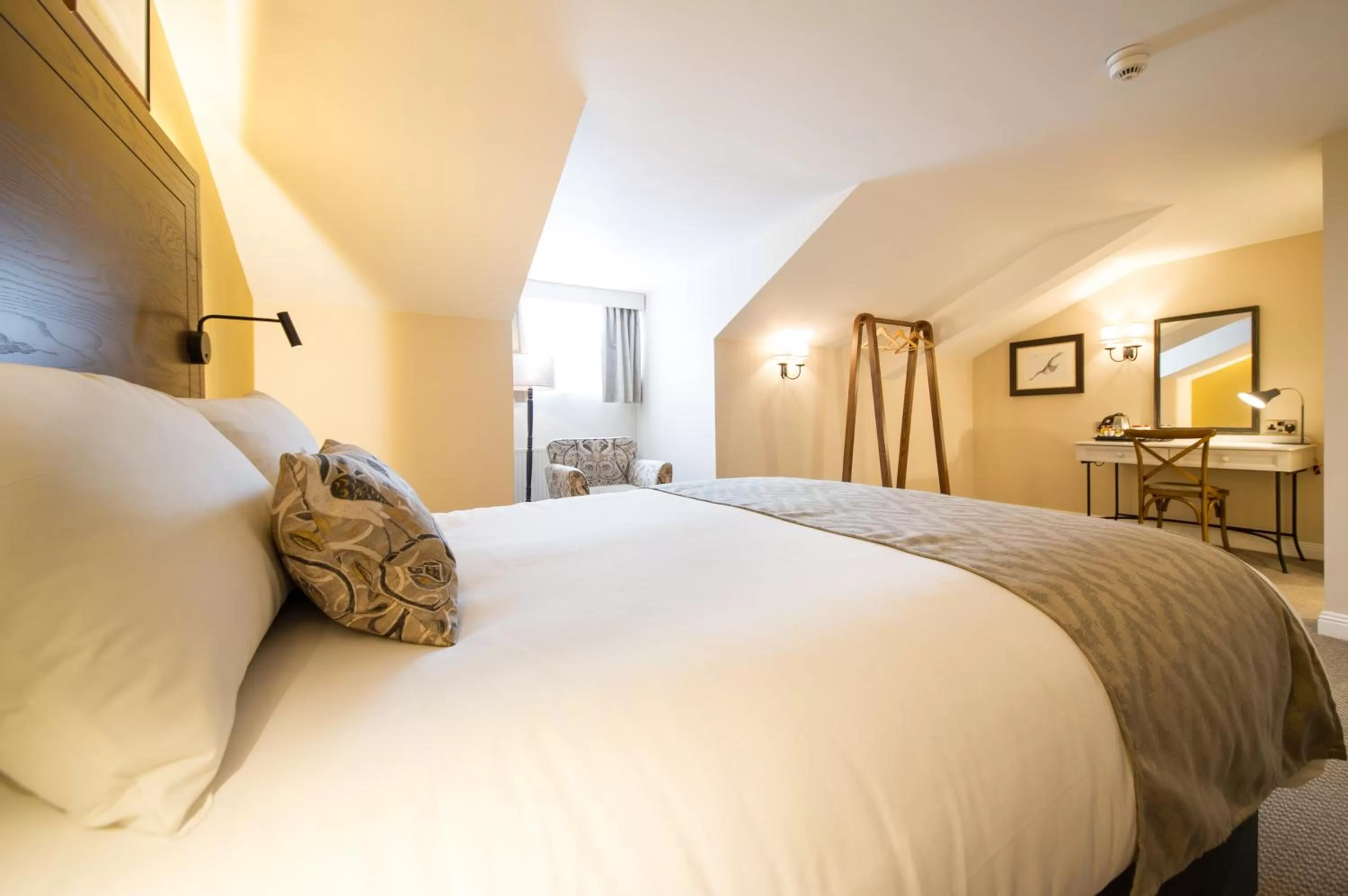 Bed in The Snowy Owl by Innkeeper's Collection