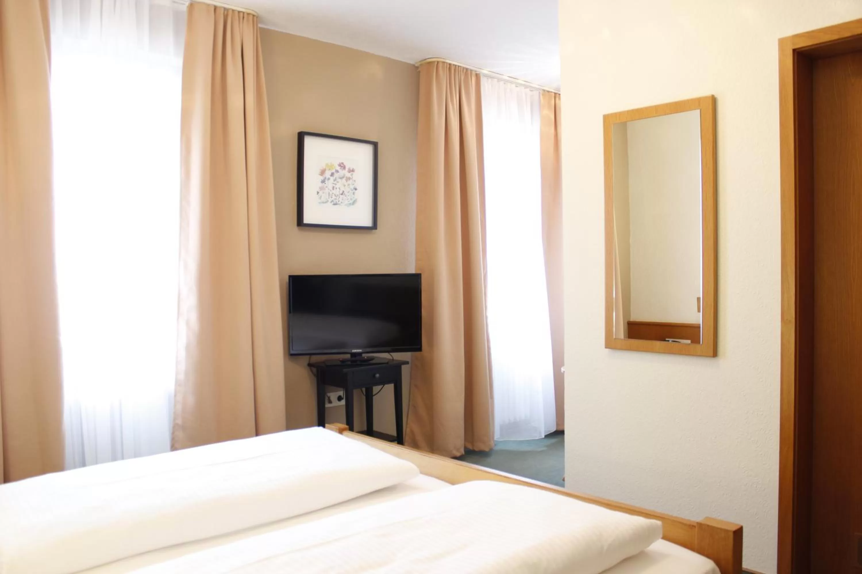 Photo of the whole room, Bed in City Hotel Würzburg