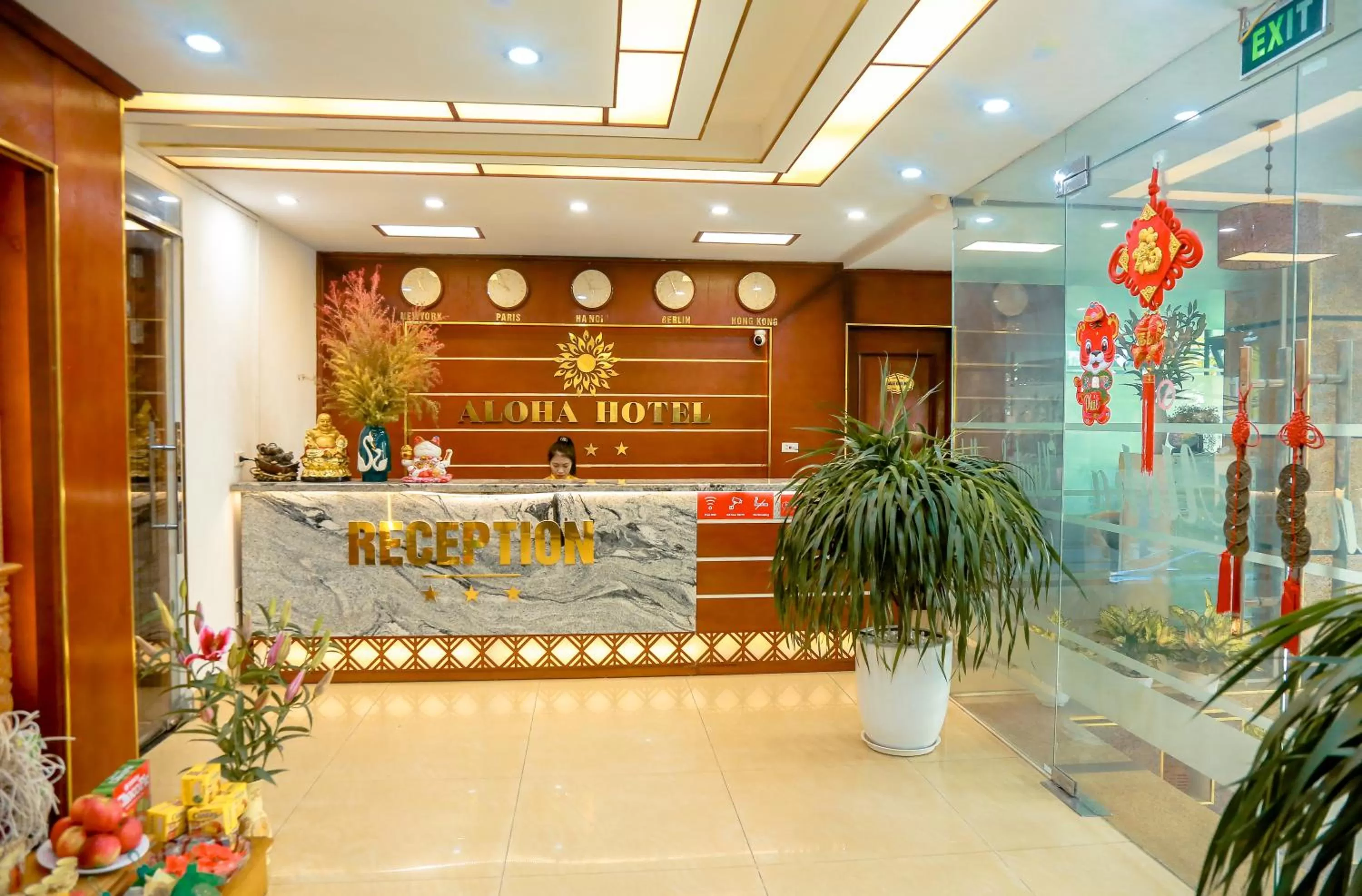 Property logo or sign in Aloha Hotel