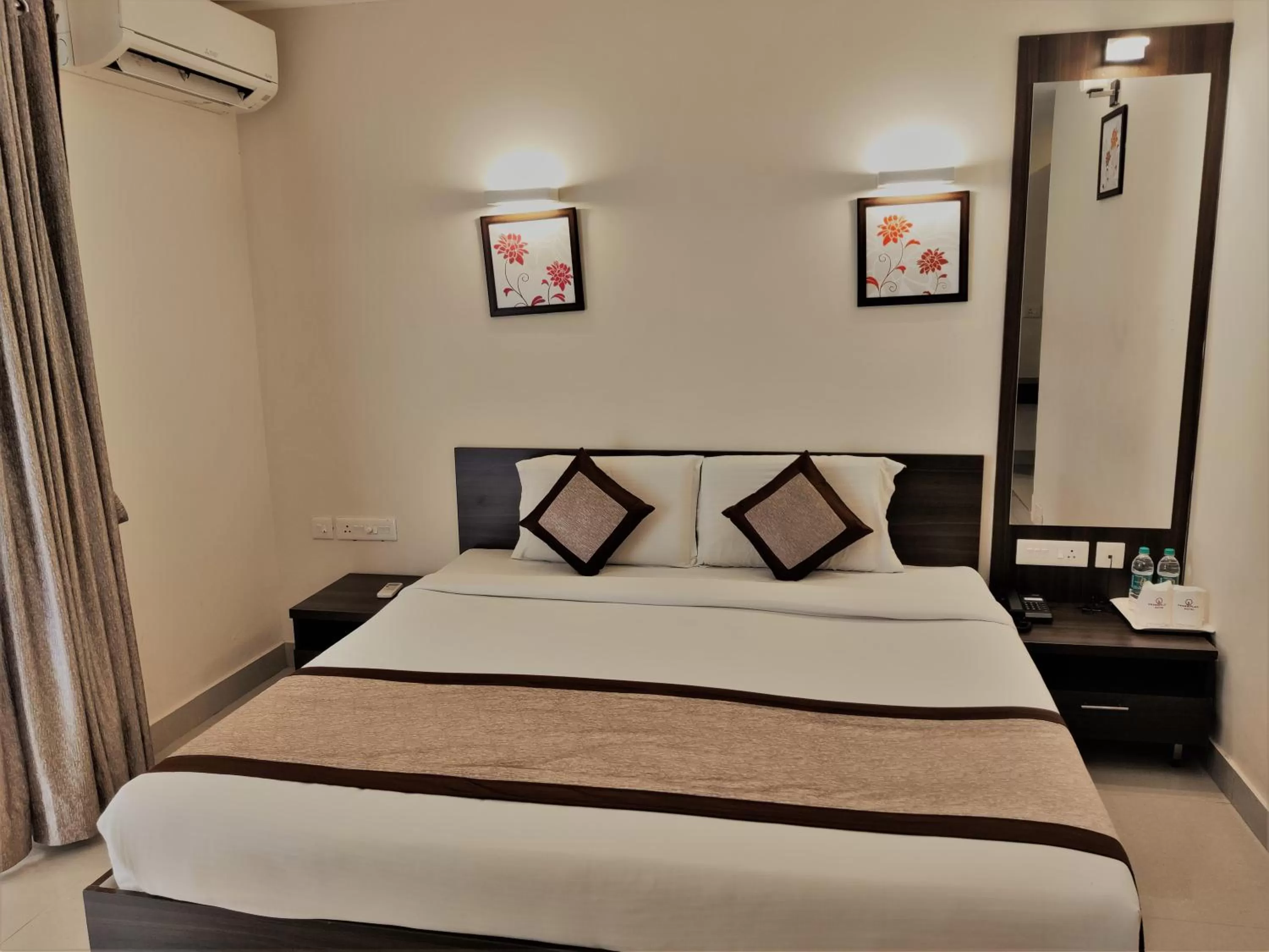 Bed in Grand Plaza Hotel