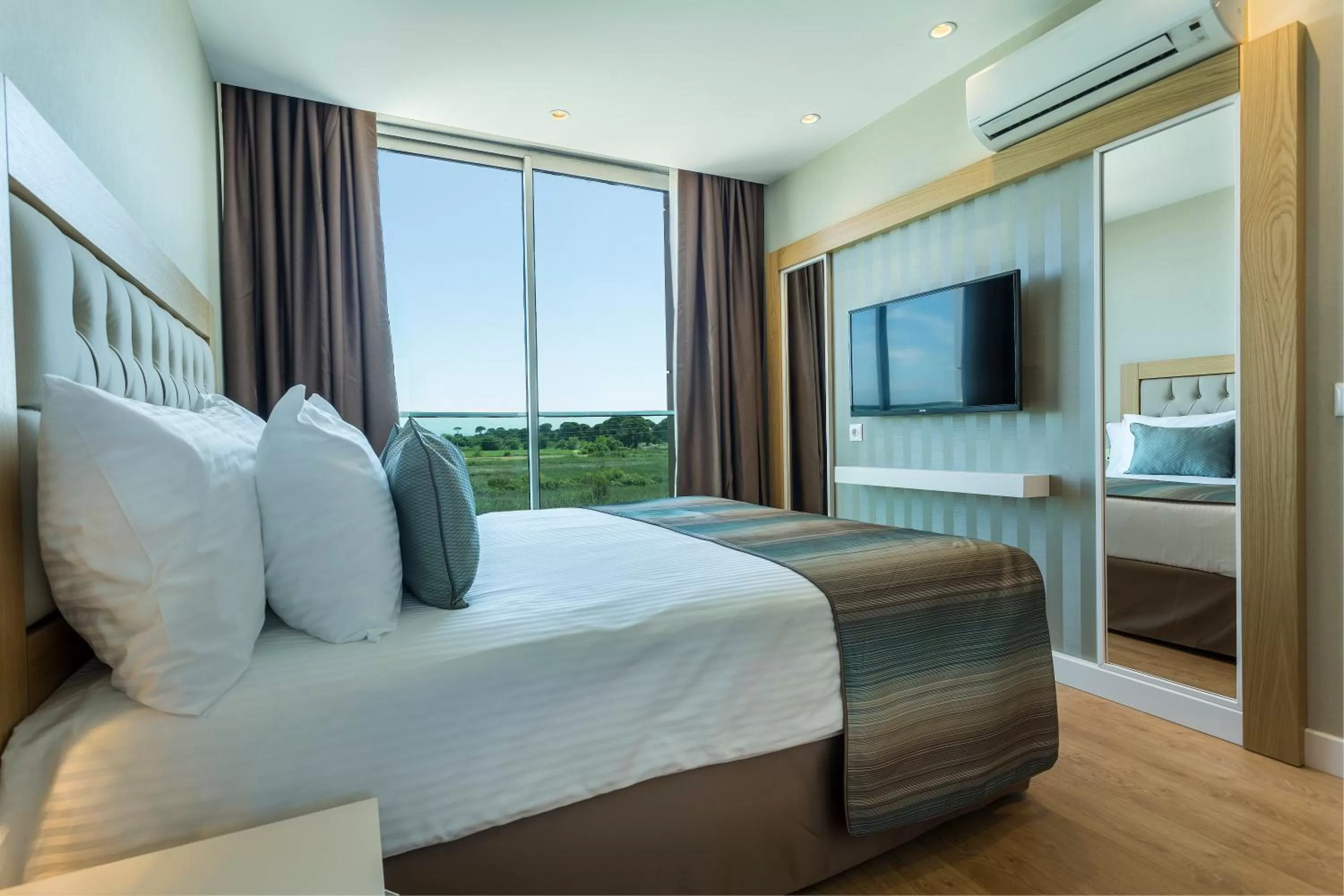 Bed in Aska Lara Resort & Spa Hotel