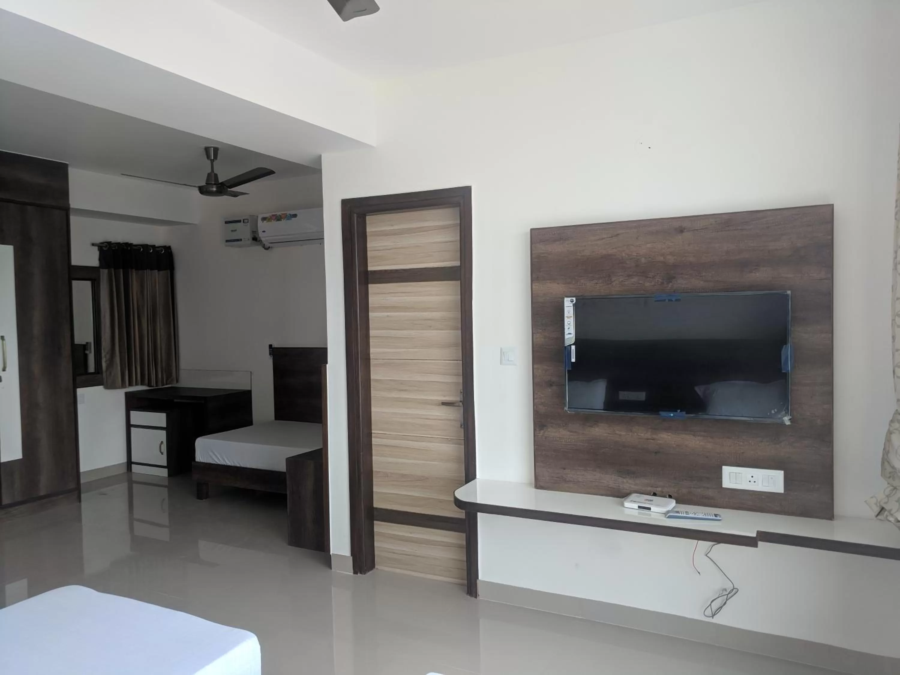 Bedroom, TV/Entertainment Center in Pride Home