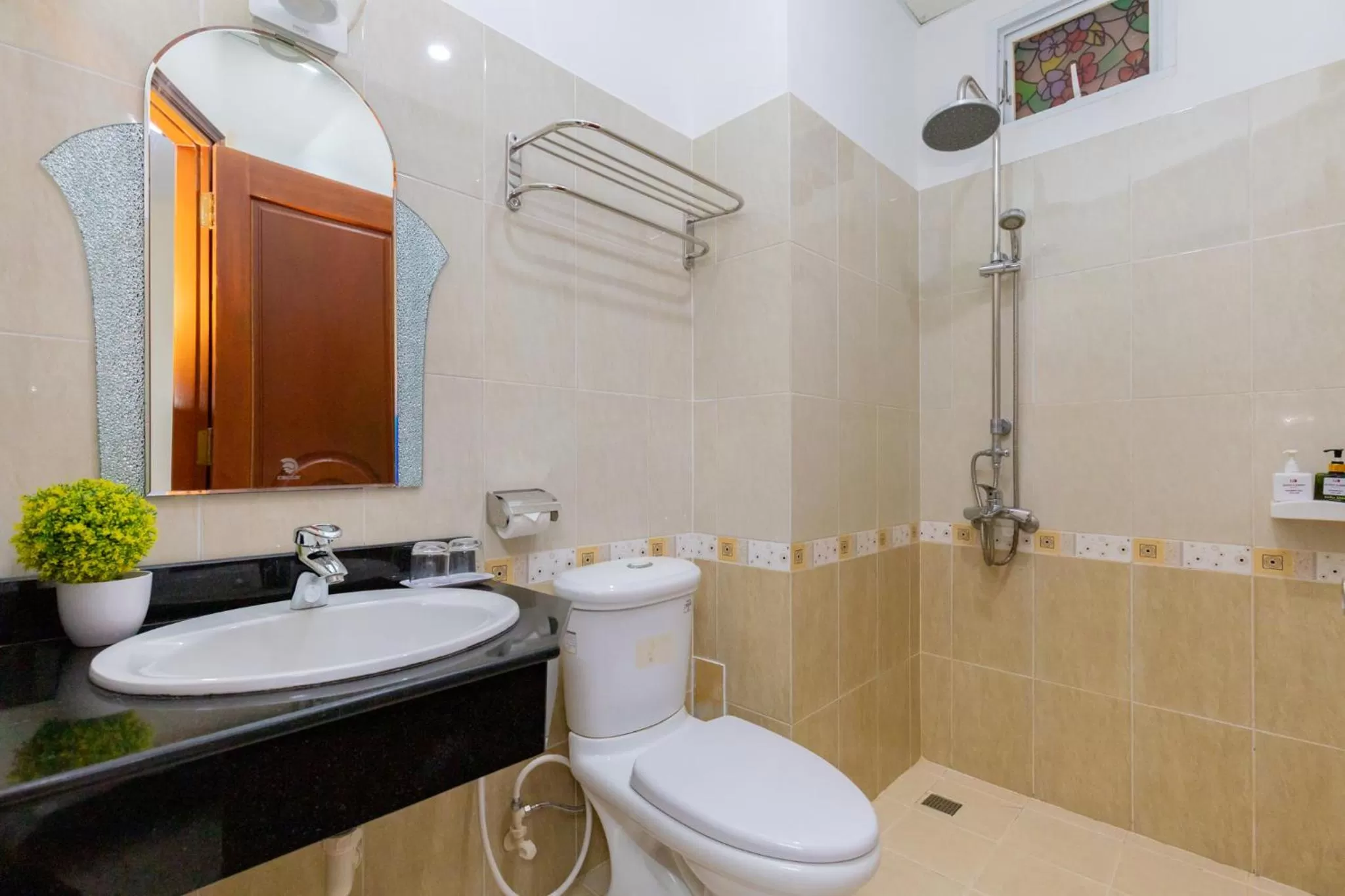 Shower in Queen Garden Hotel & Apartment