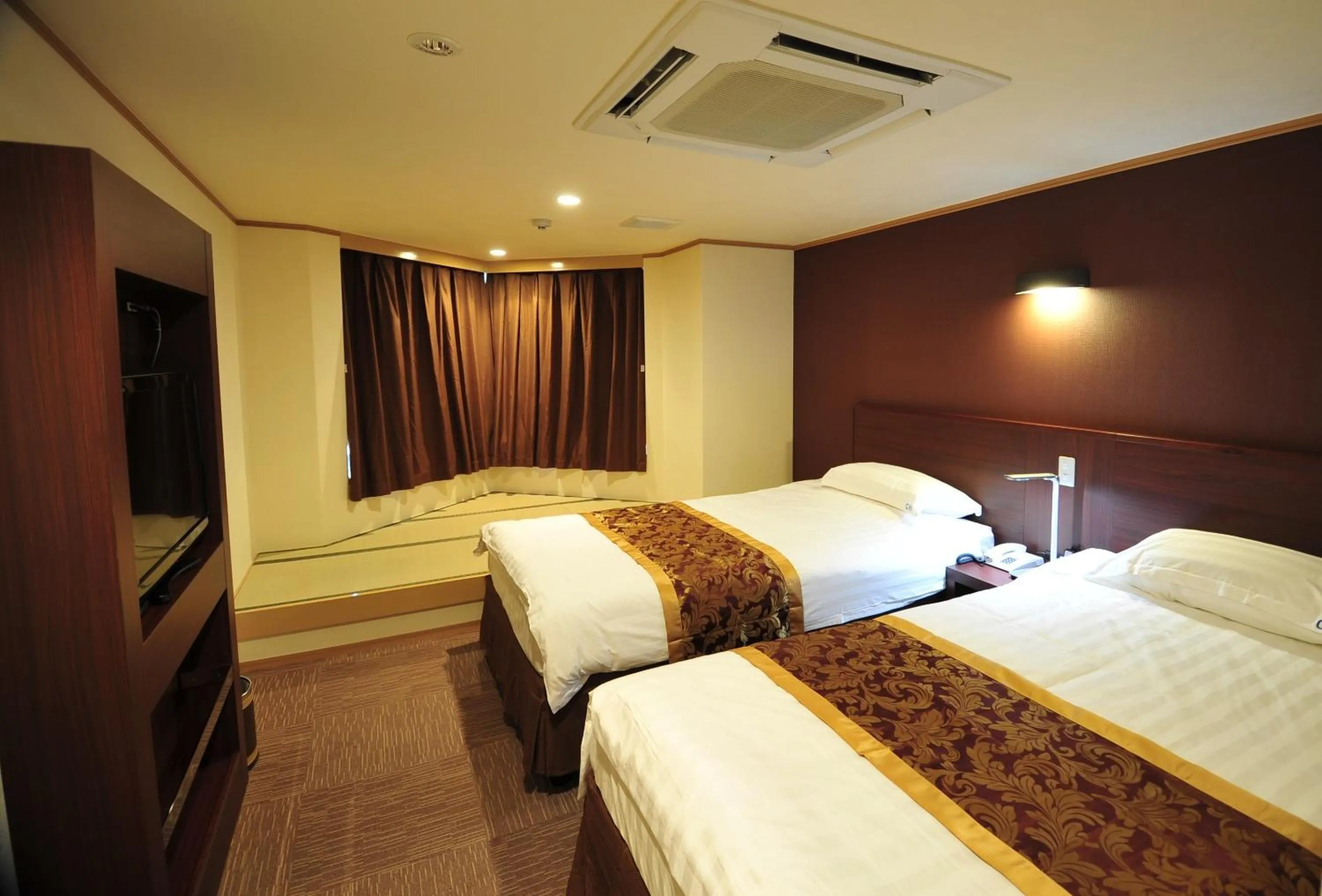 Bed in Hotel Marine World