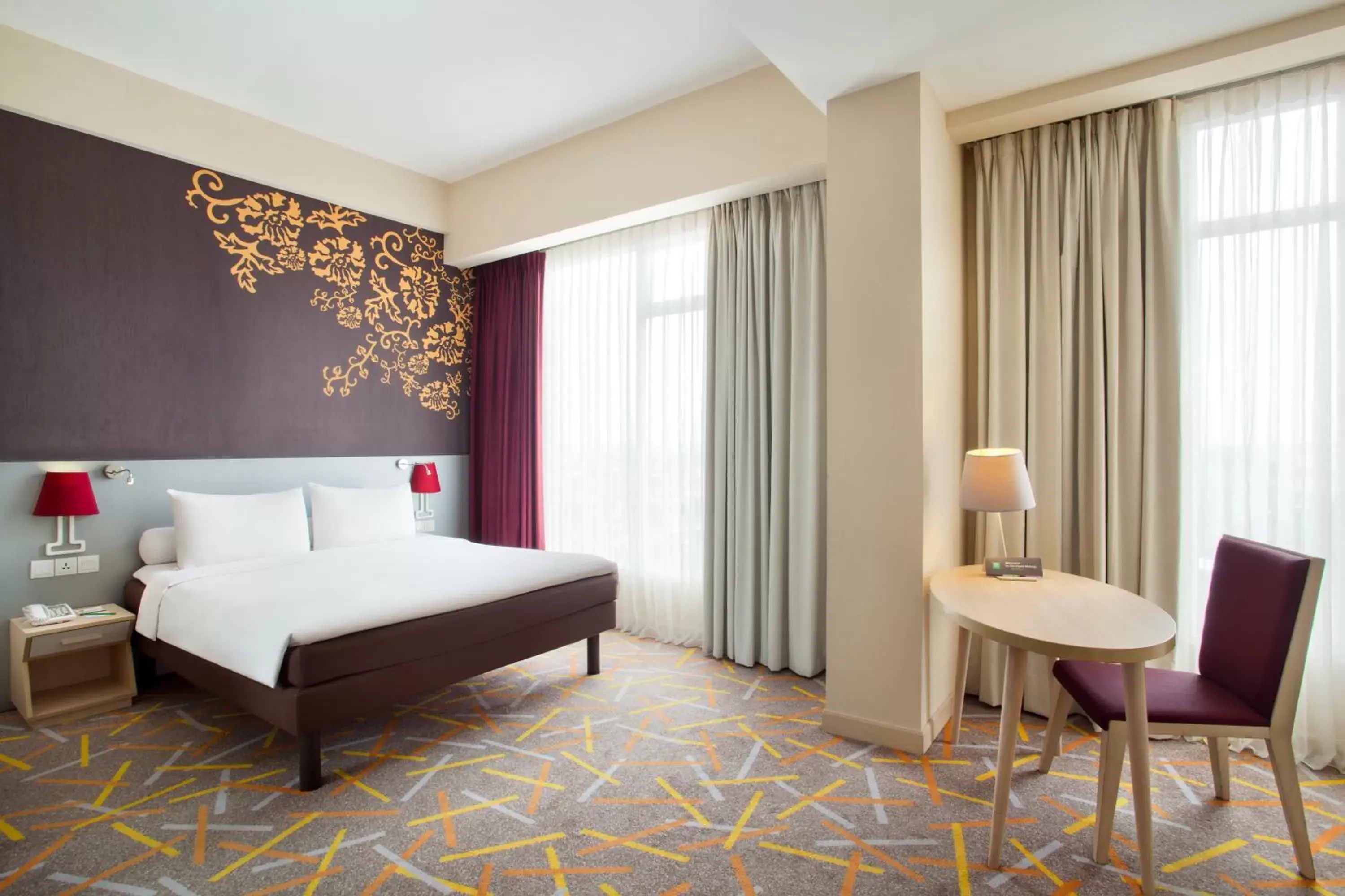 Deluxe King Room with Sofa in Ibis Styles Malang Deluxe King Room with Sofa in Ibis Styles Malang