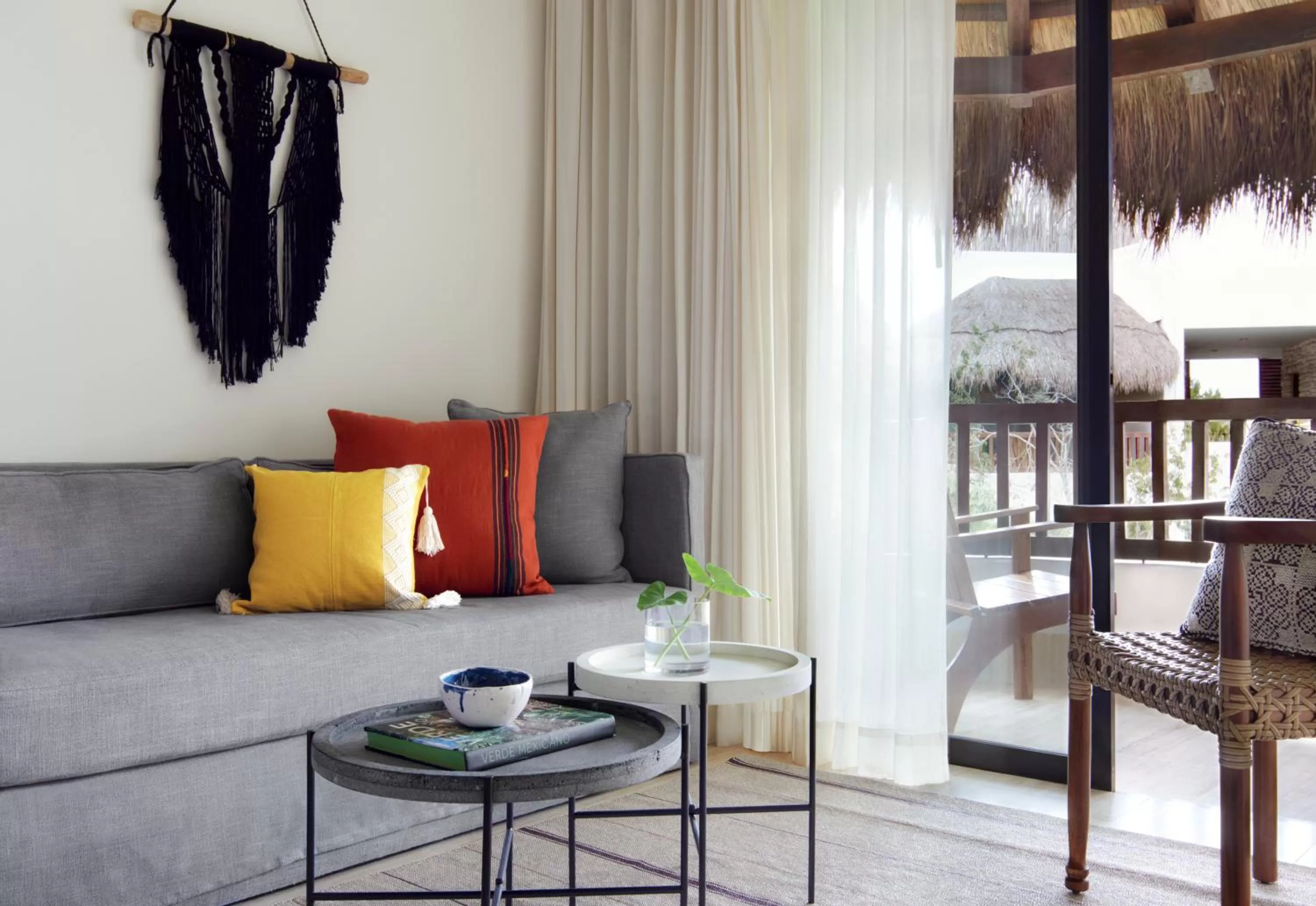 Seating area in Kimpton Aluna Resort Tulum by IHG