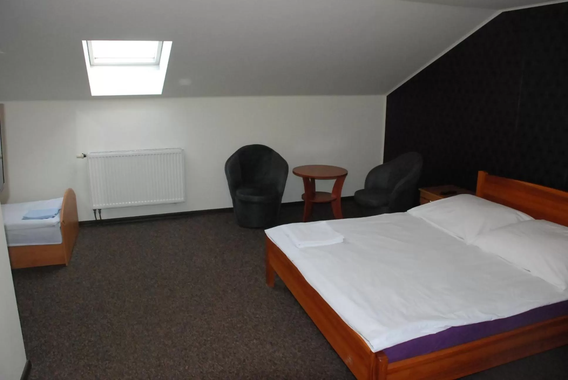 Bed in Hotelik Manhatan