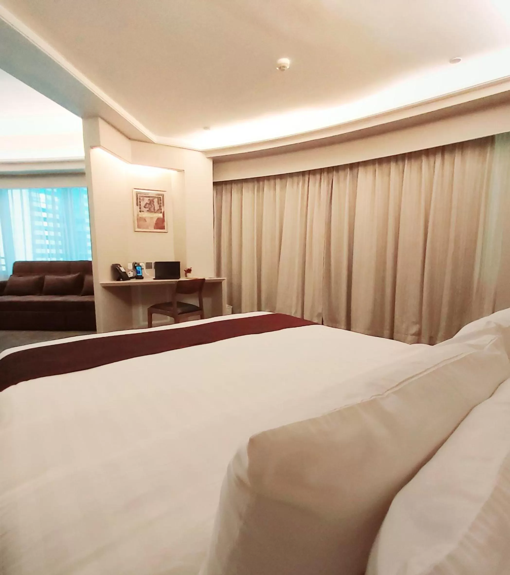 Photo of the whole room, Bed in South Pacific Hotel