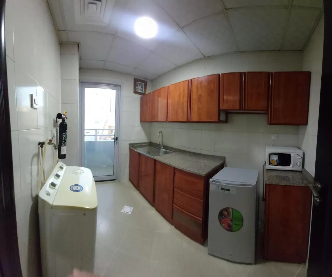 Kitchen or kitchenette in Al Khaleej Plaza Furnished Hotel Apartments