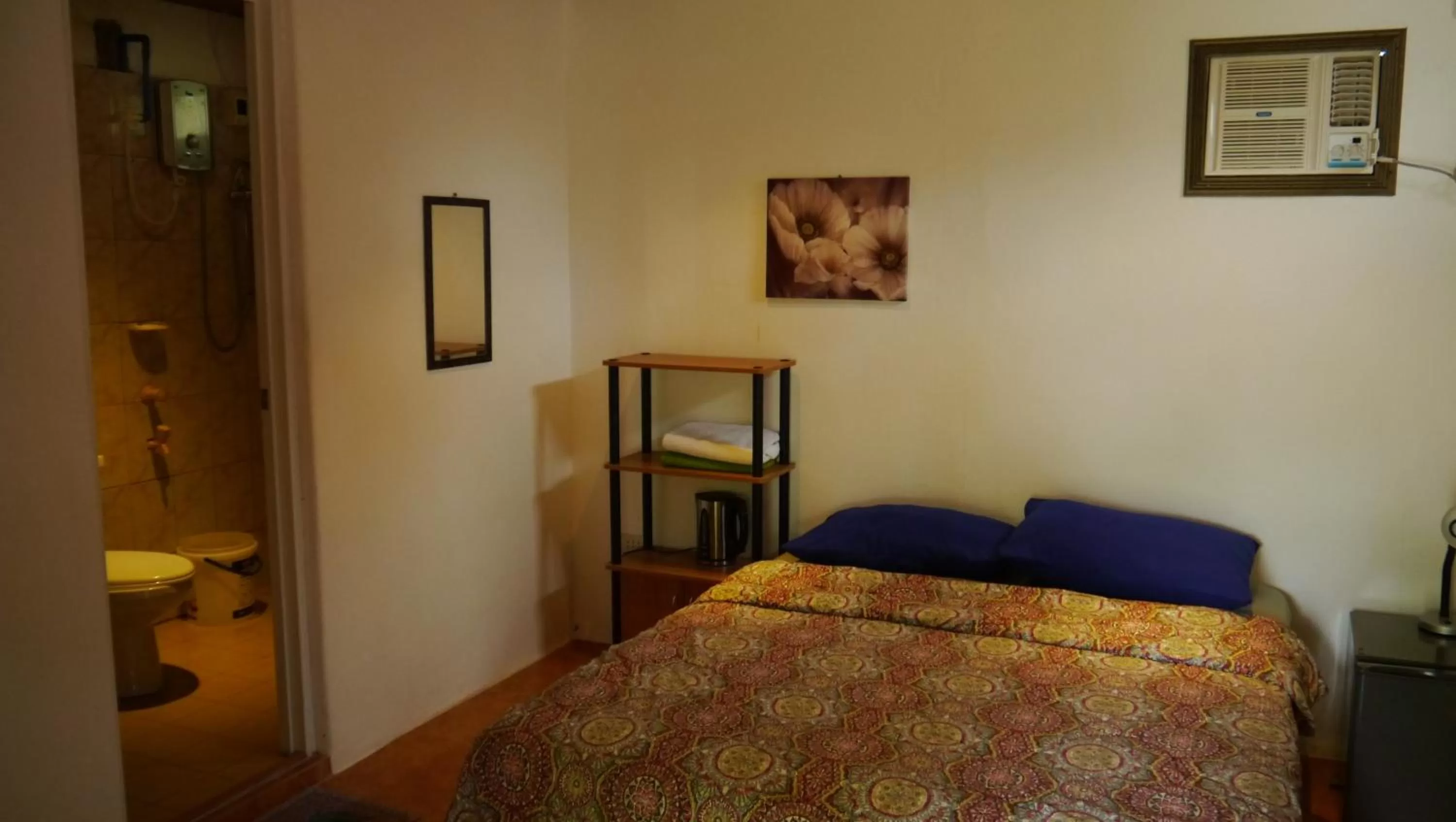 Bed in Moalboal T Breeze Coastal Resort