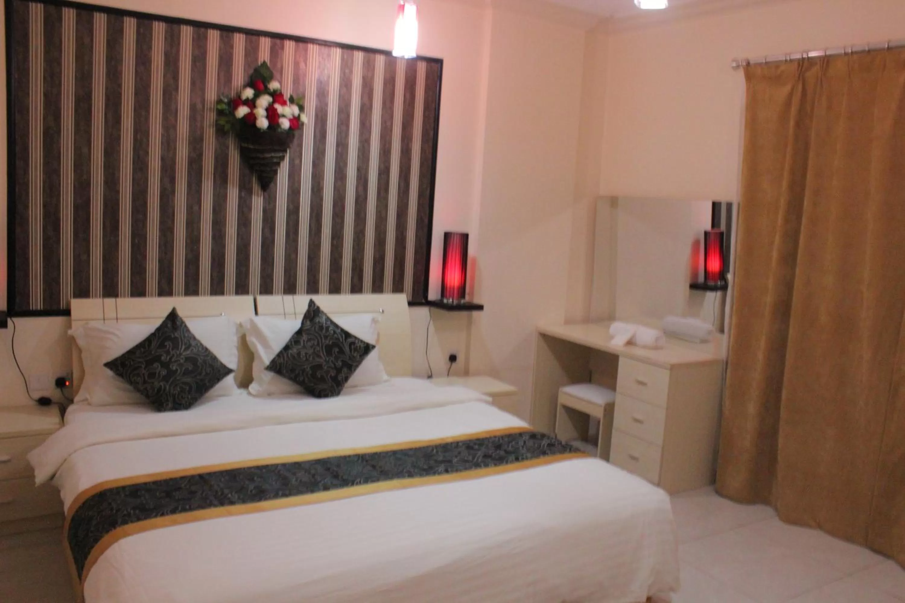 Bed in Al Amoria Apartments