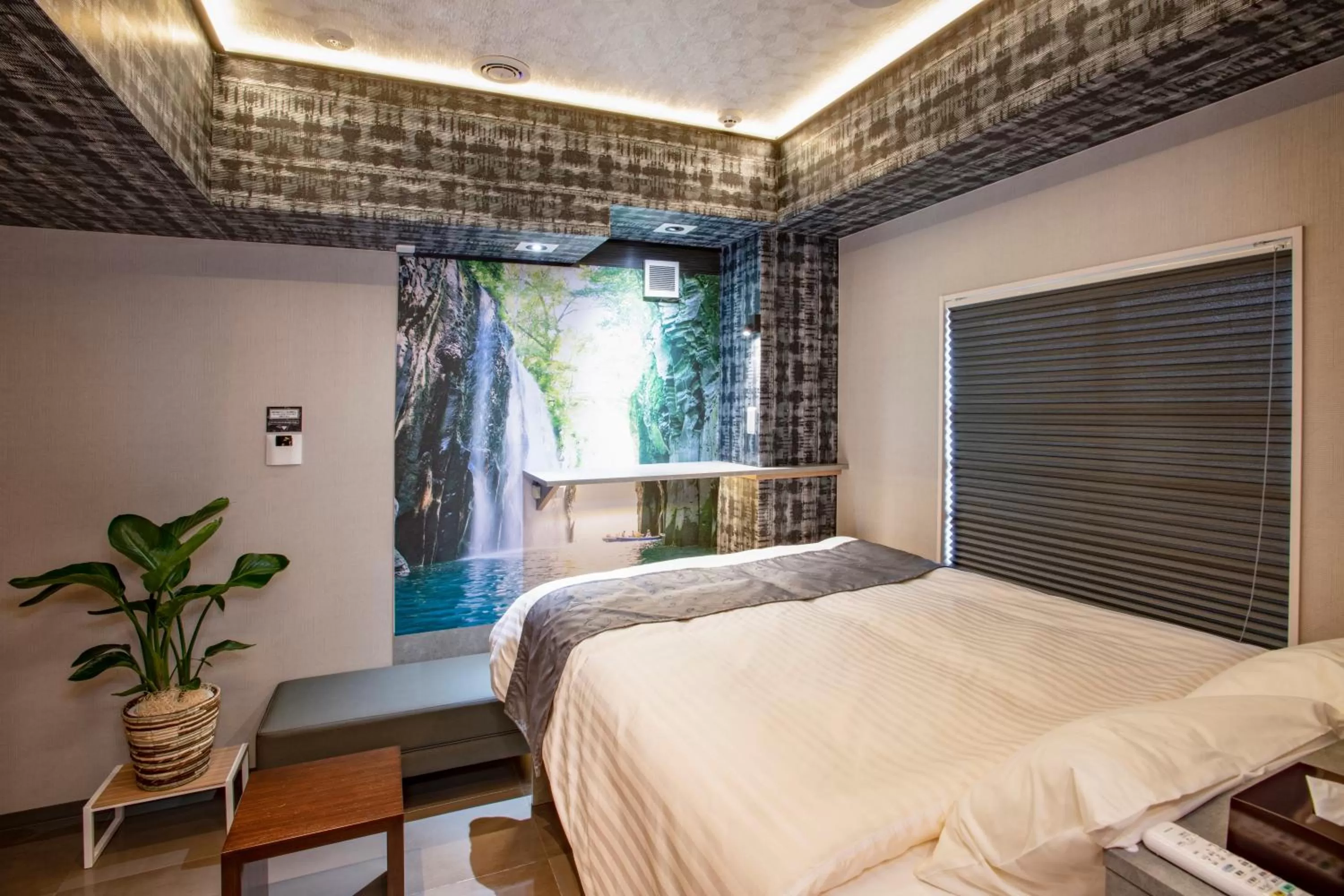 Bed in Pinpon Hotel Hiroshima