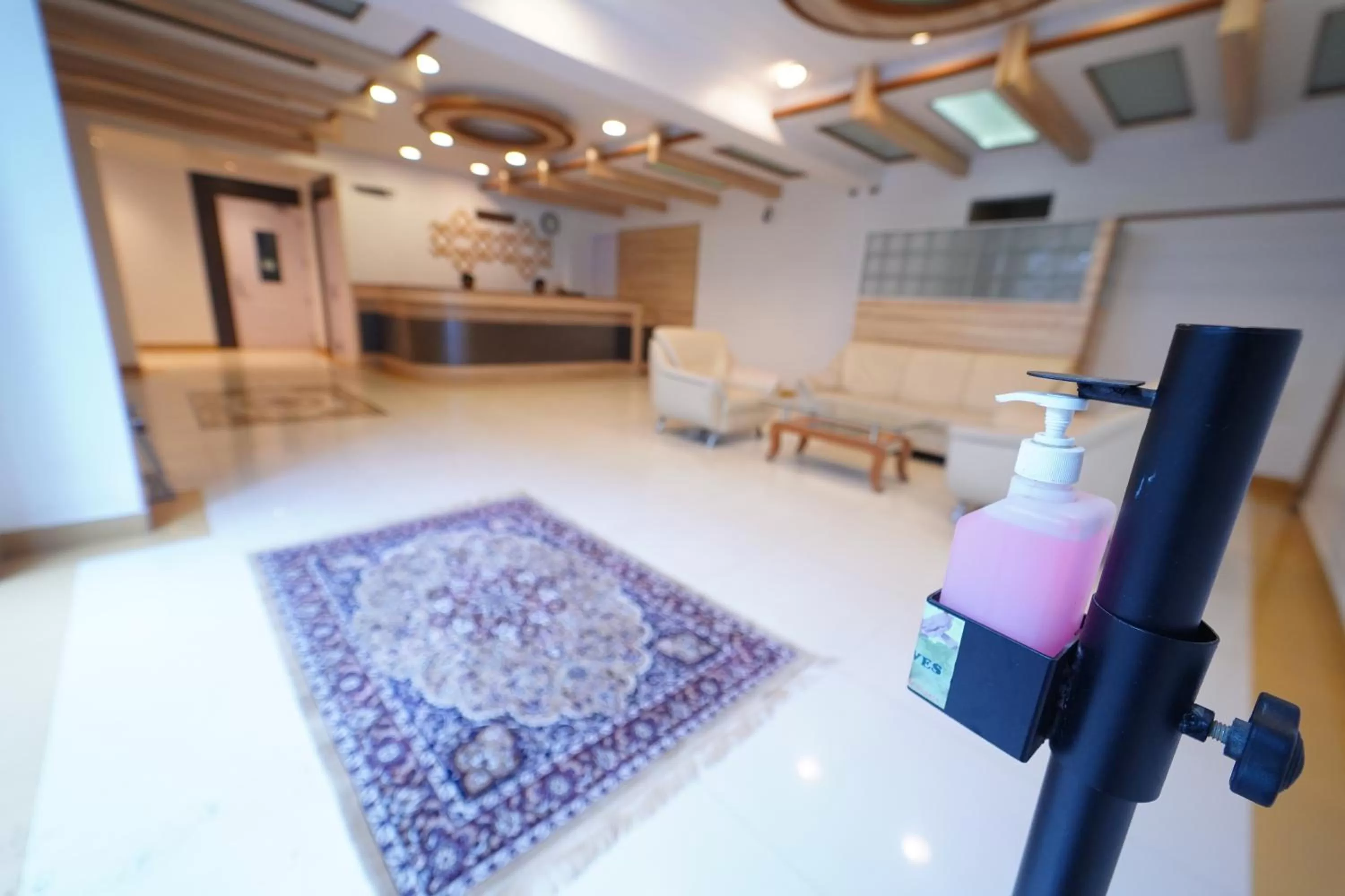 Seating area in Hotel Palmyra Grand Inn