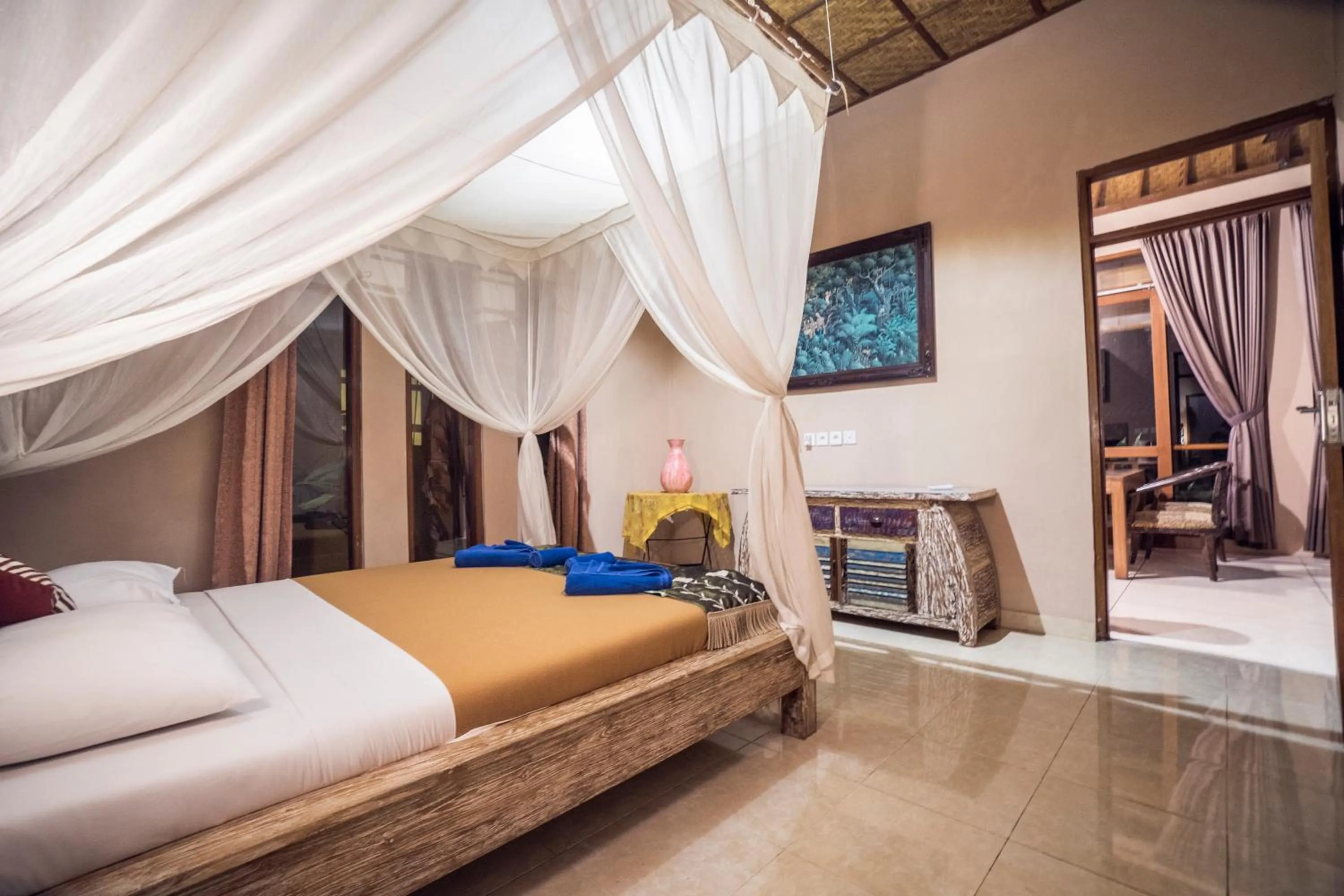 Bed in Gajah Biru Bungalows