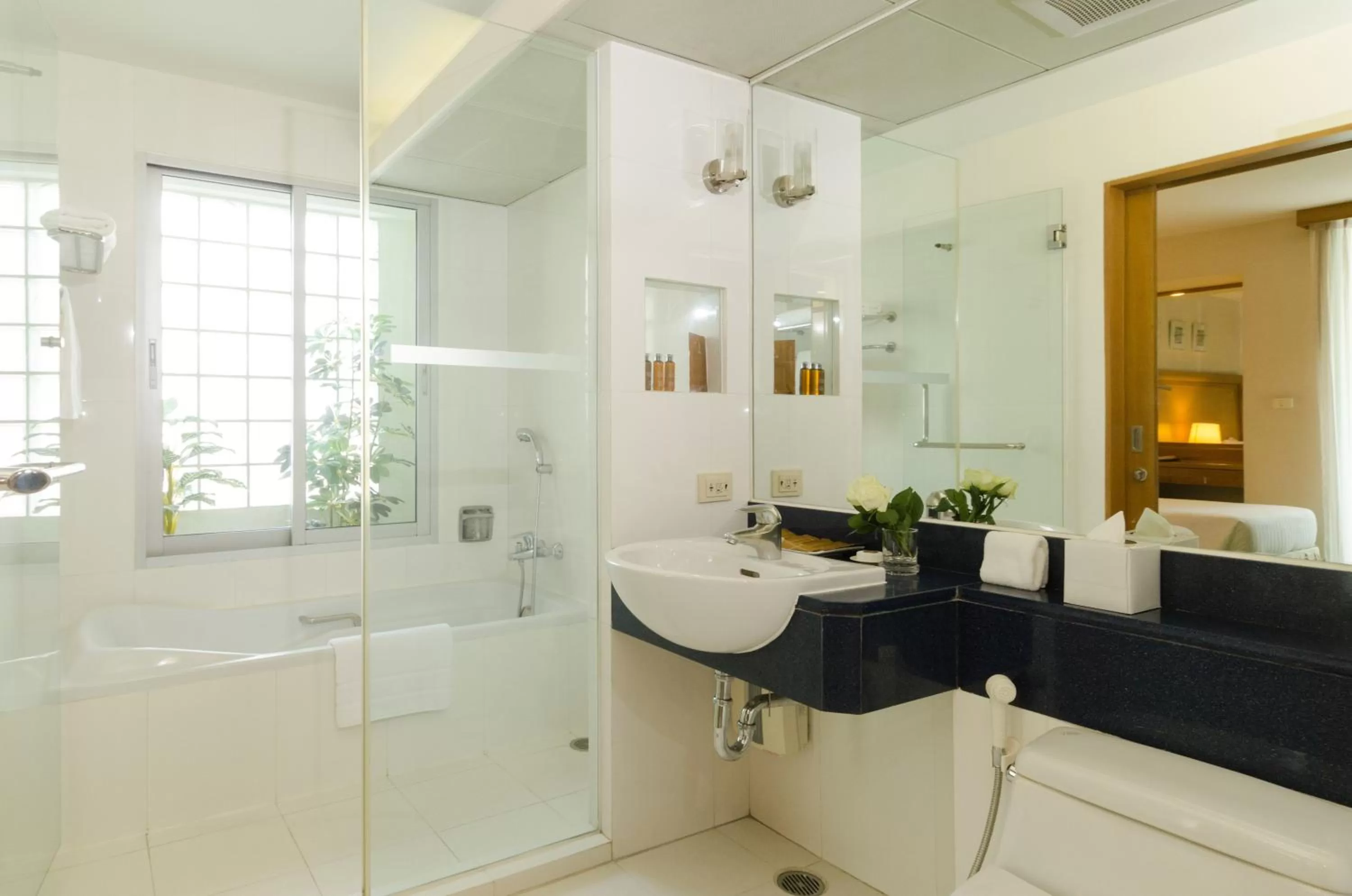 Bathroom in AT EASE saladaeng by AETAS