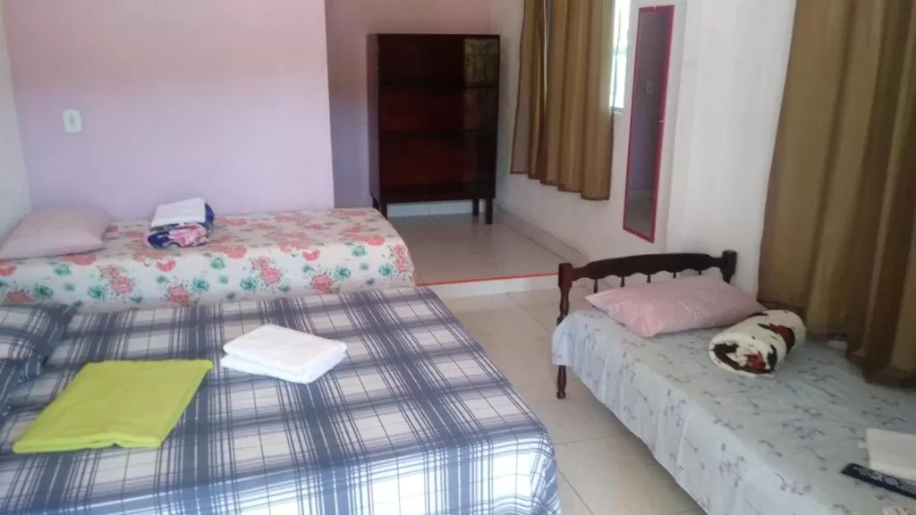 Bed in Pousada dos Ventos