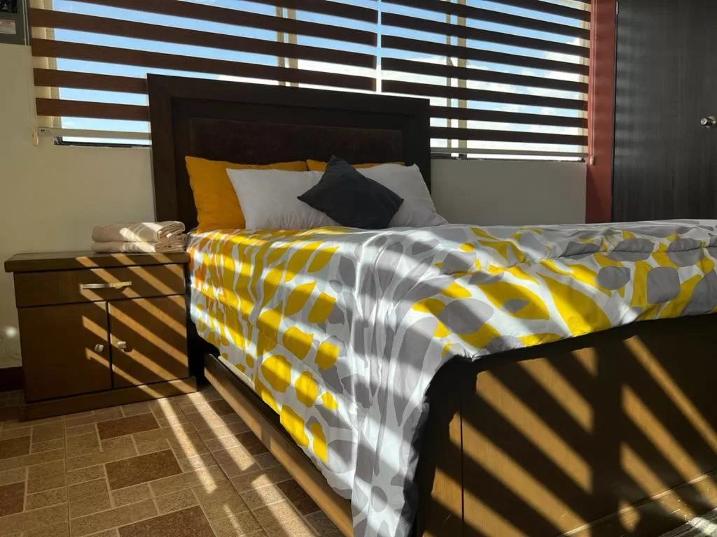 Bed in Departamentos Bonsai