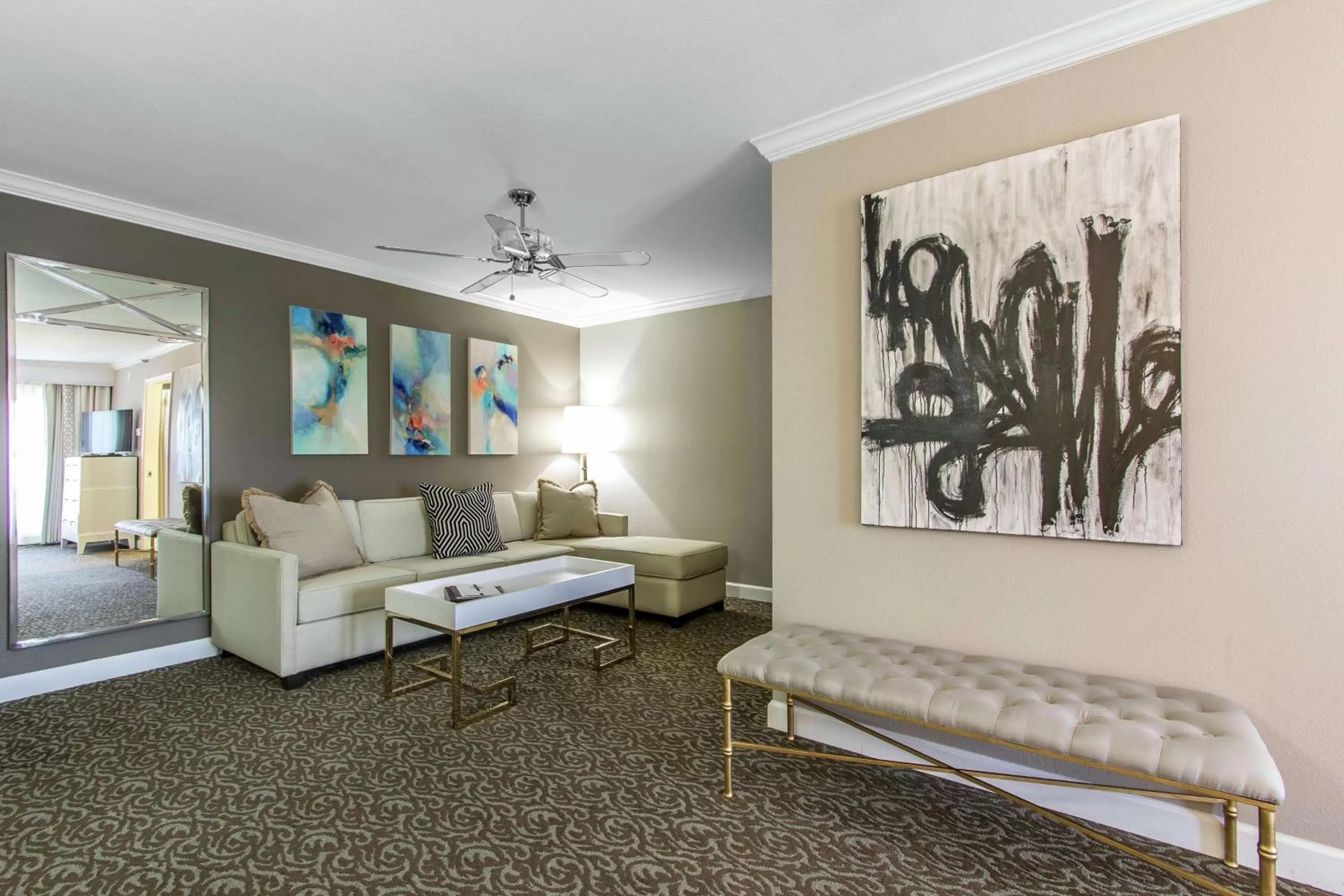 Living room in The Burgundy Hotel, Tapestry Collection by Hilton