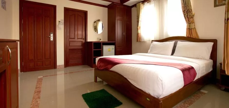 Bed in Bluebird Inn Pattaya