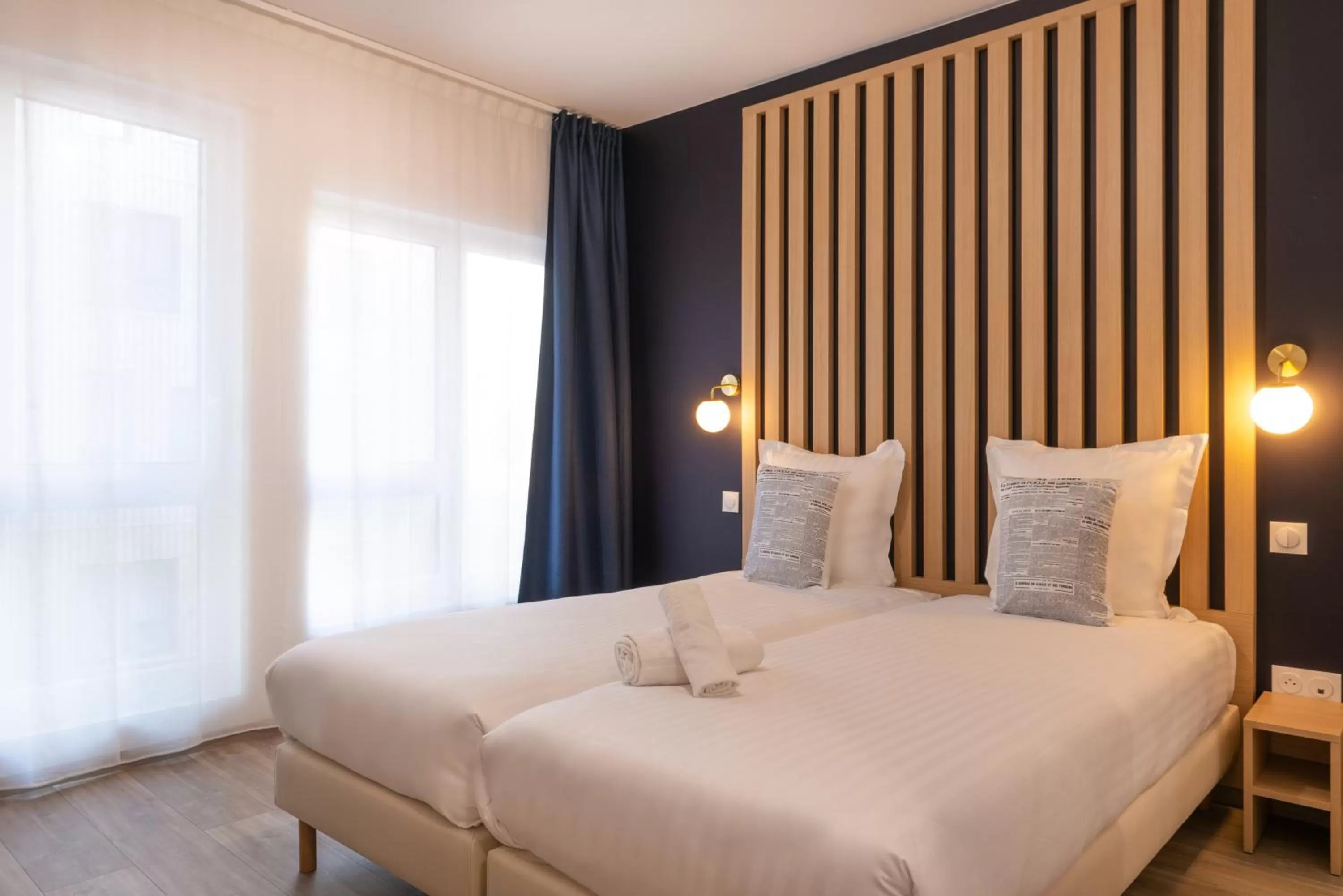 Photo of the whole room in The Originals Résidence Le Monde Paris Ivry Confluence