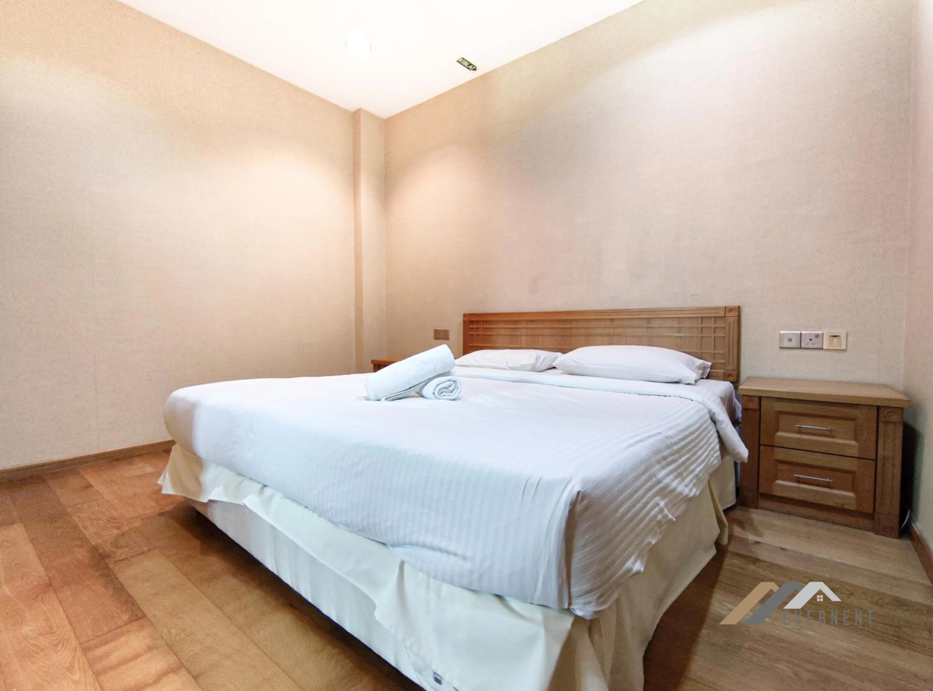 Bed in Mciti Suites by Evernent