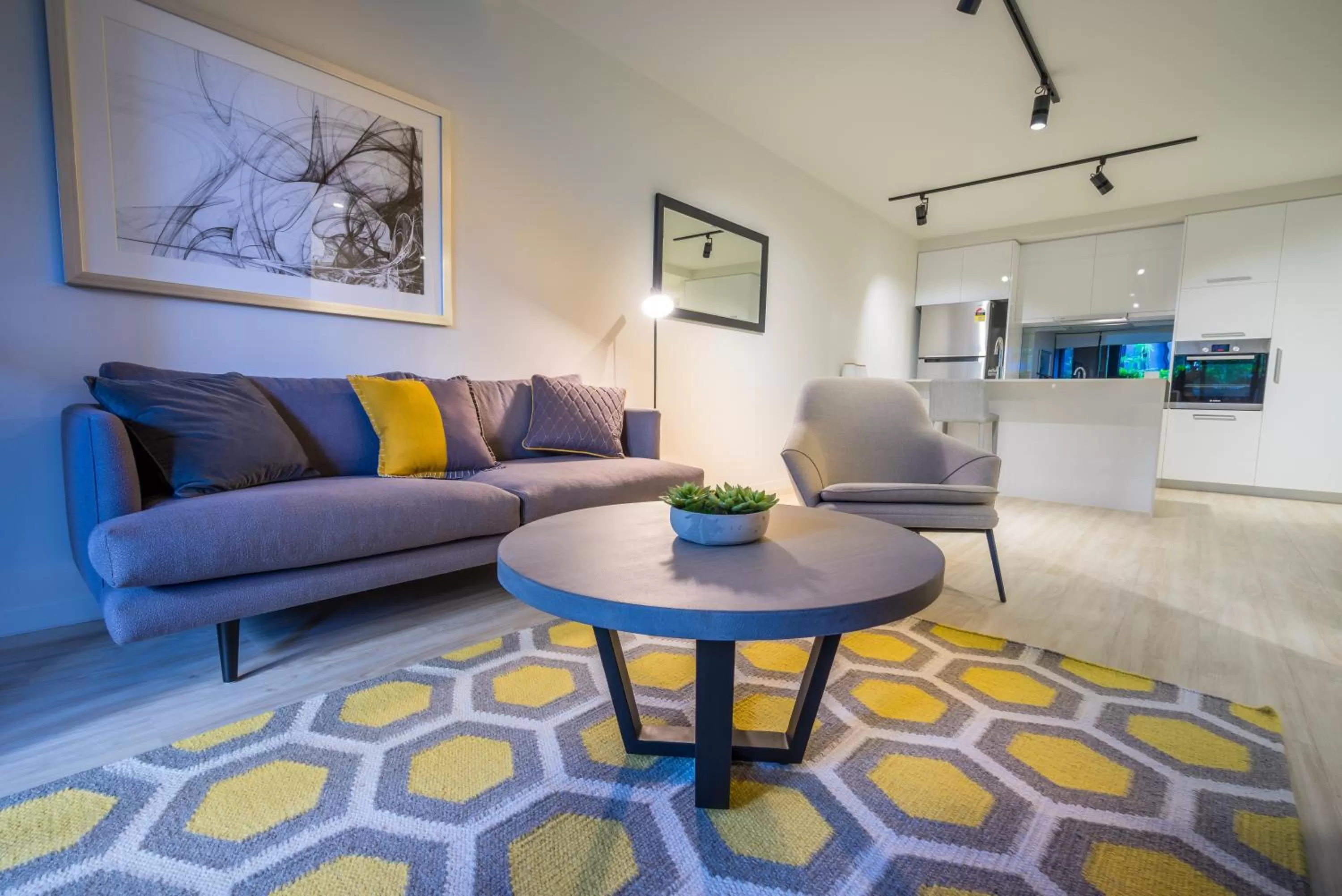 Living room in Arena Apartments by CLLIX