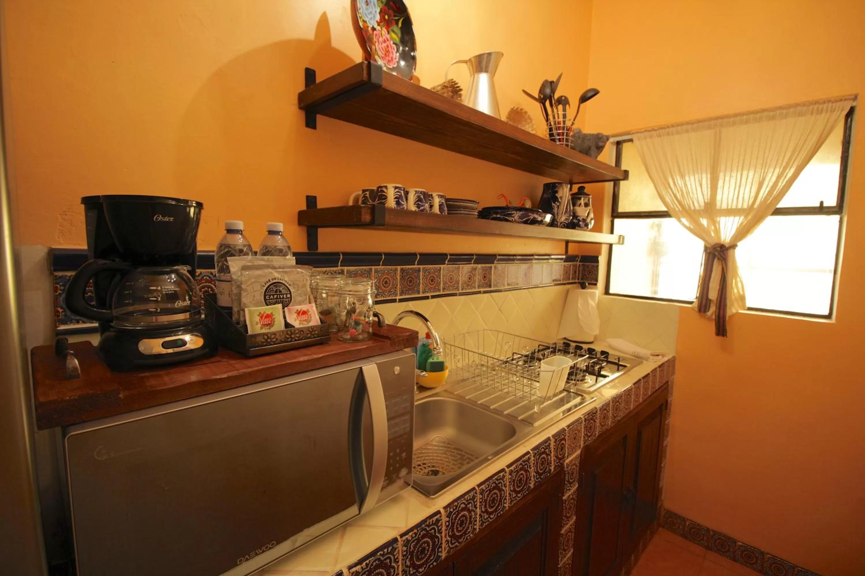 Kitchen or kitchenette in Casa Mia Suites