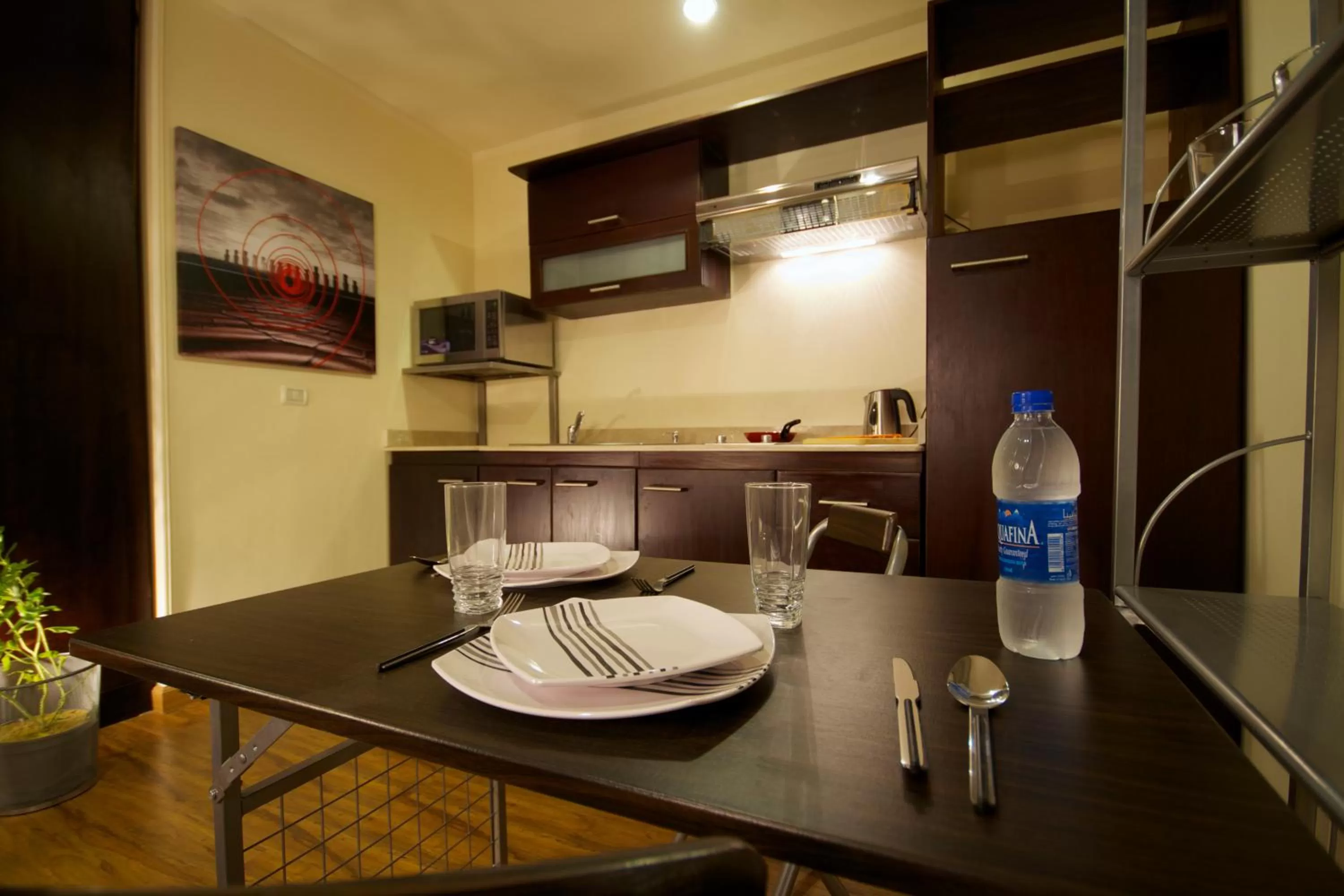 Kitchen or kitchenette in NewCity Hotel & Suites