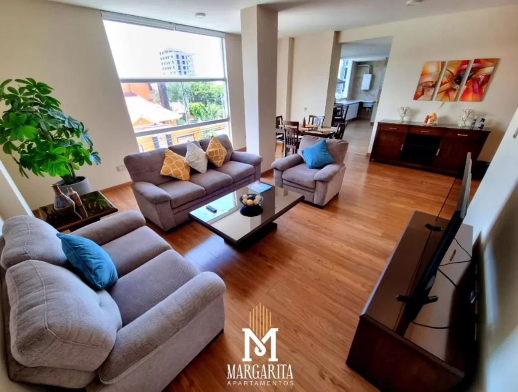 Communal lounge/ TV room in Margarita Apartamentos