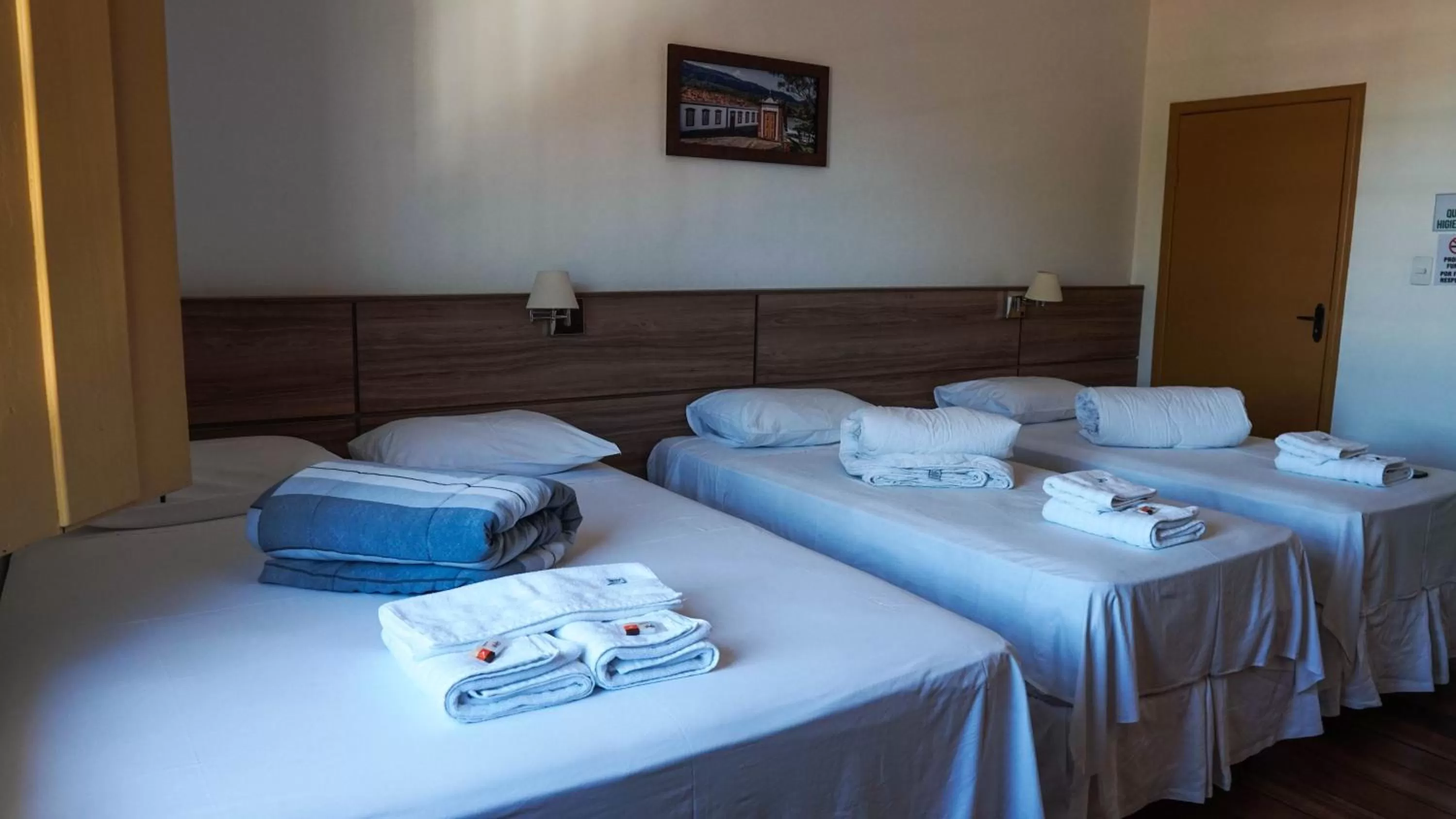 Bed in Pousada o Amanhecer