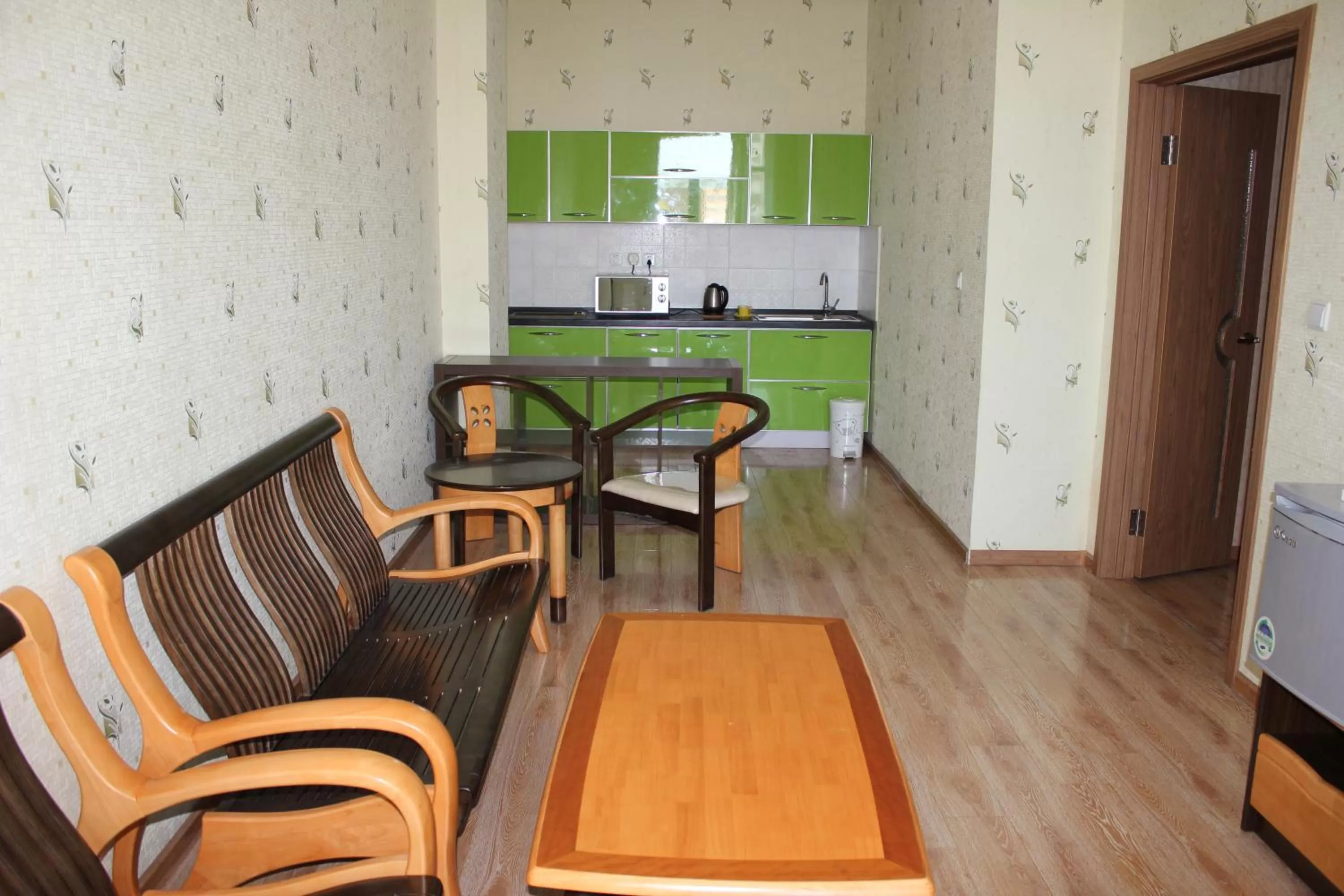Kitchen or kitchenette, Seating Area in Tsolmon's Serviced Apartments