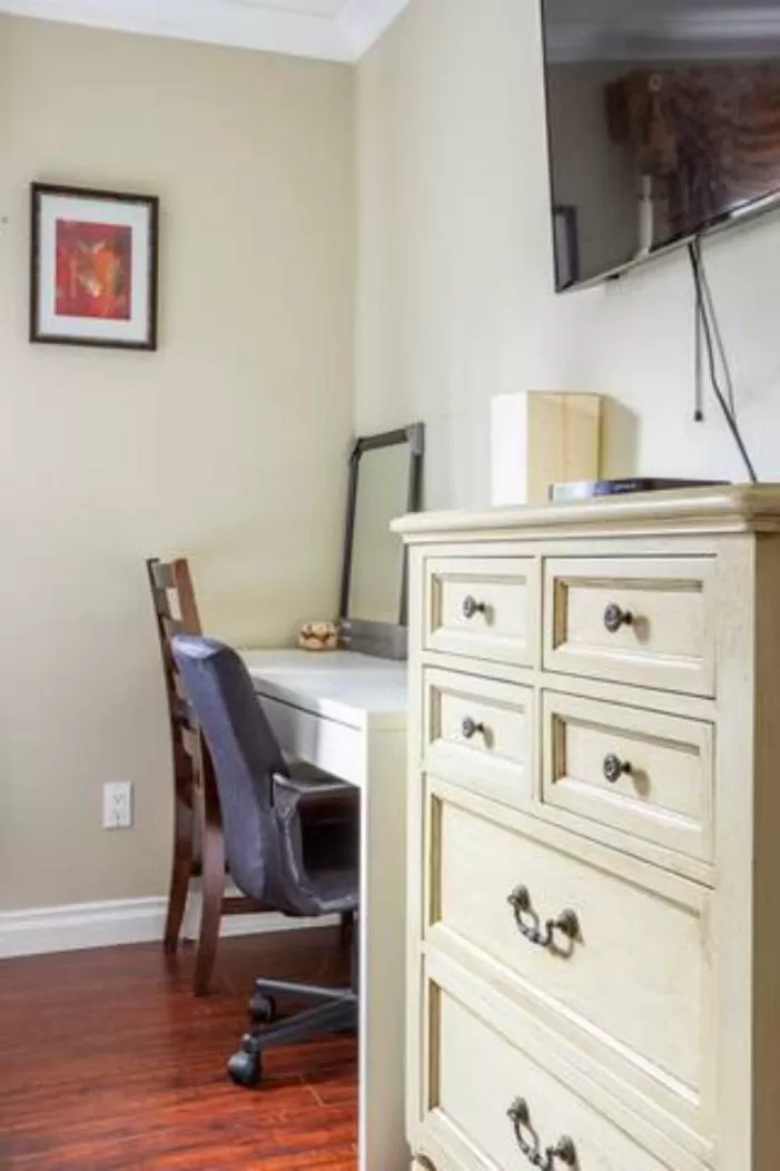 hair dresser, TV/Entertainment Center in Jane's private rooms with shared washroom