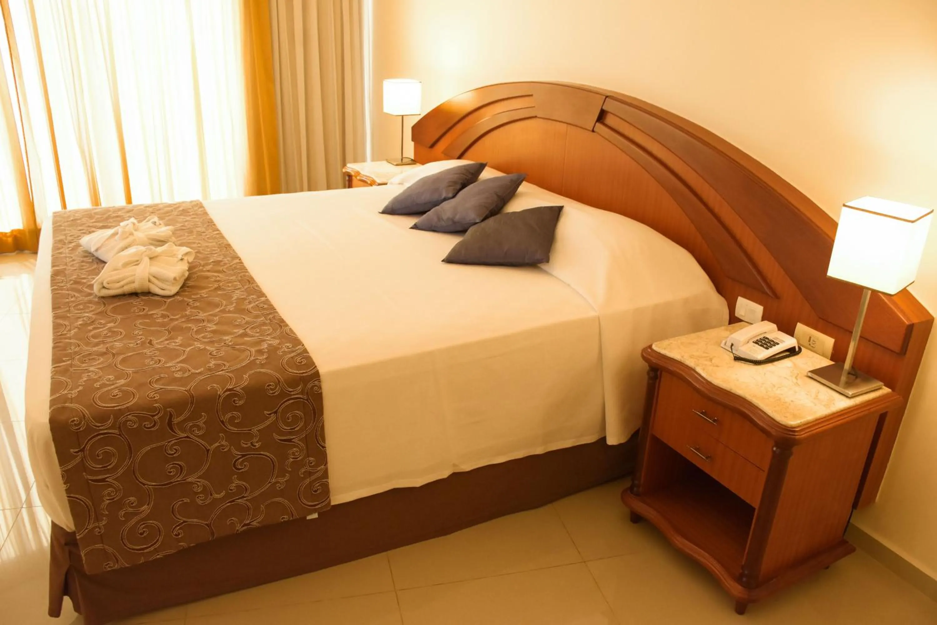 Bed in Hotel Golden Park Internacional Foz & Convenções By Nacional Inn