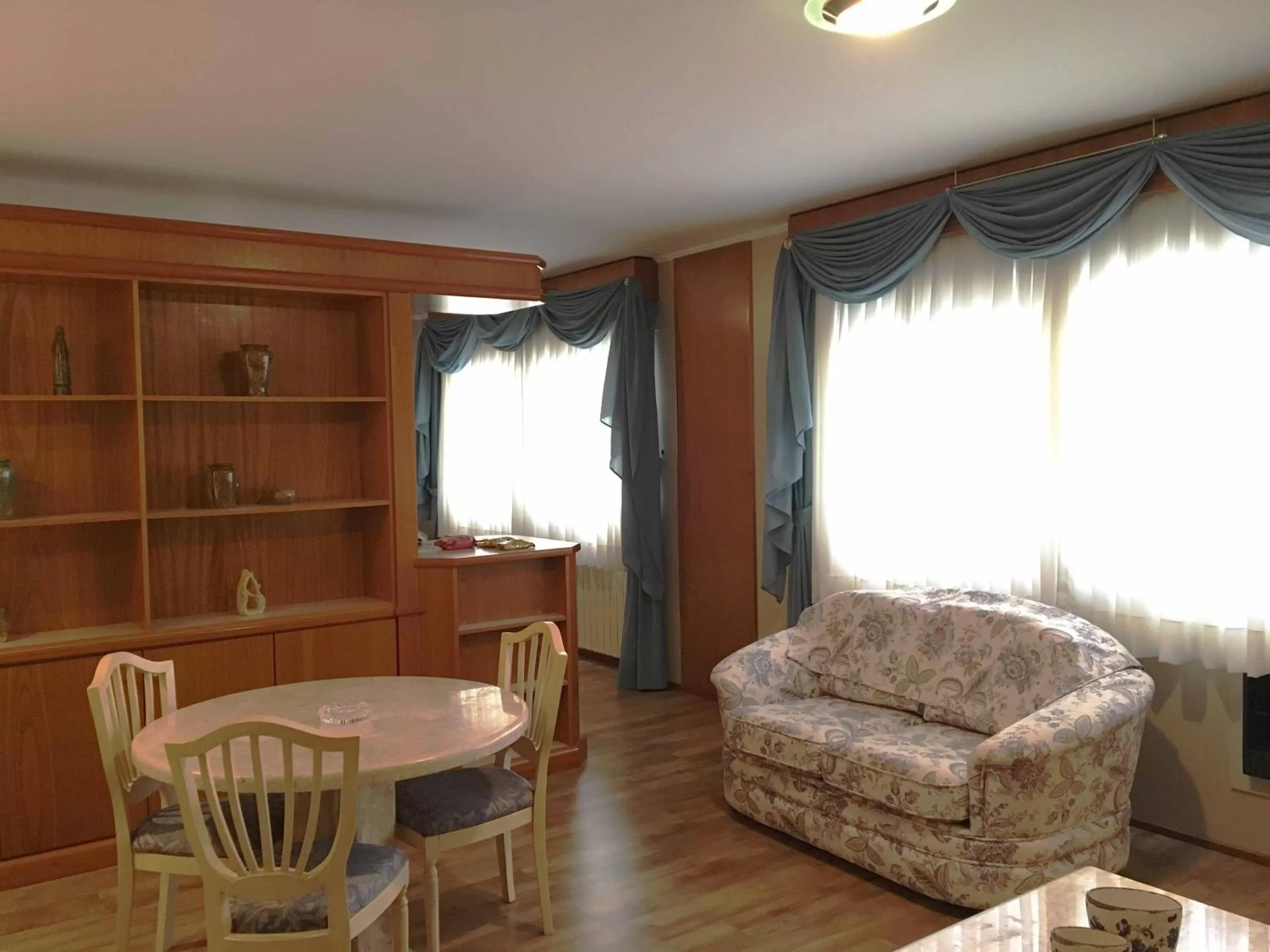 Living room, Seating Area in Cosmos Hotel