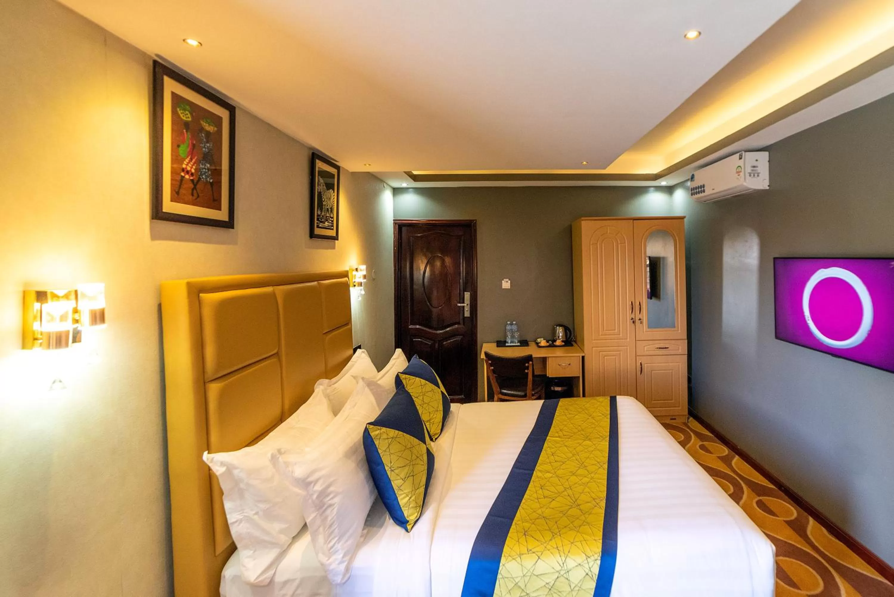 Bed in Afro Park Hotel