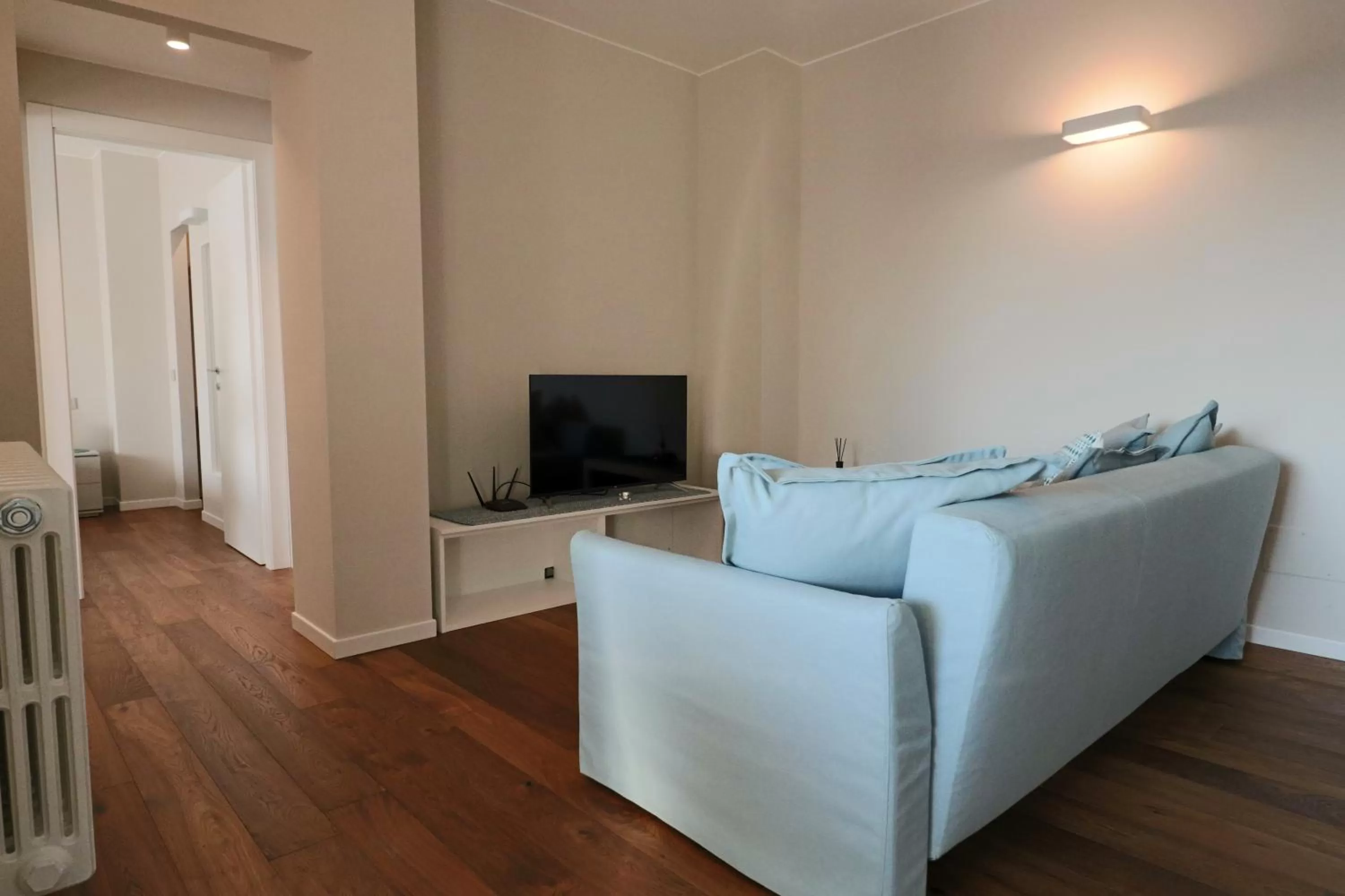 Communal lounge/ TV room in Aparthotel Isola