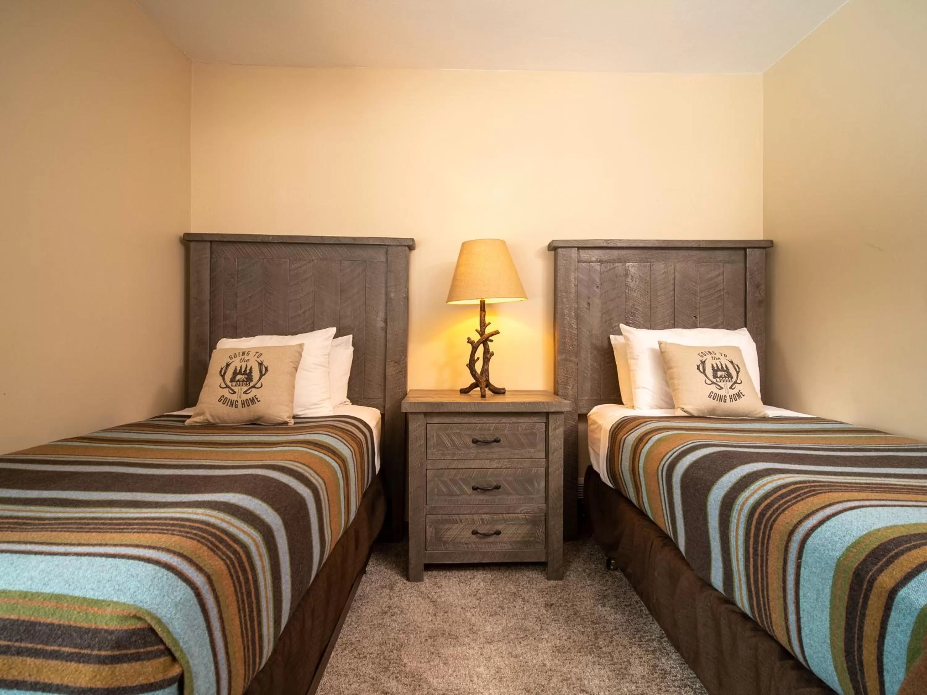 Bed in Caribou Highlands Lodge